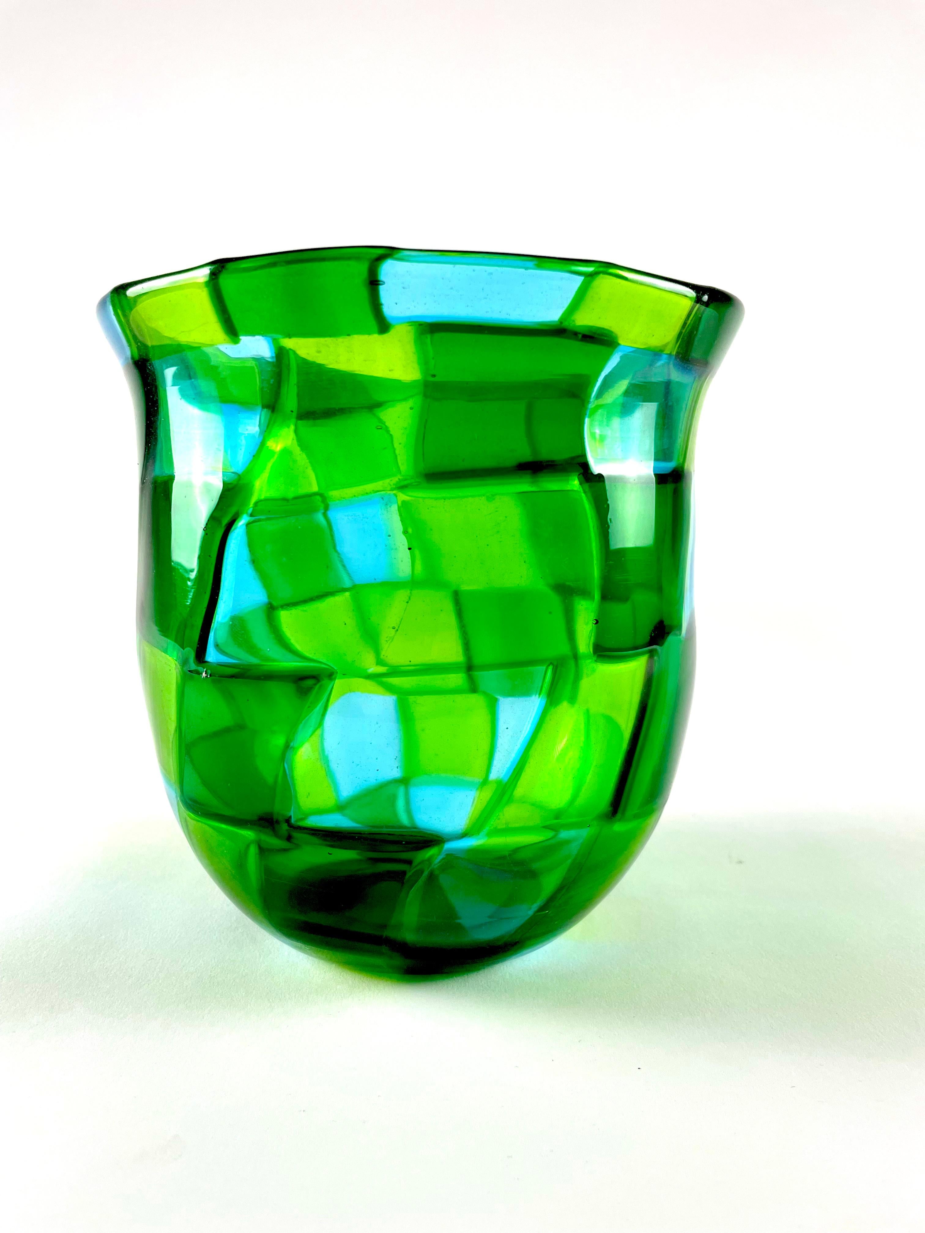 Get ready to be mesmerized by Tessere, a vintage collectible design by Ermanno Toso for Fratelli Toso in the late '70s. This stunning glass creation is a representation of the iconic design of Murano in those years, with its play of colors and