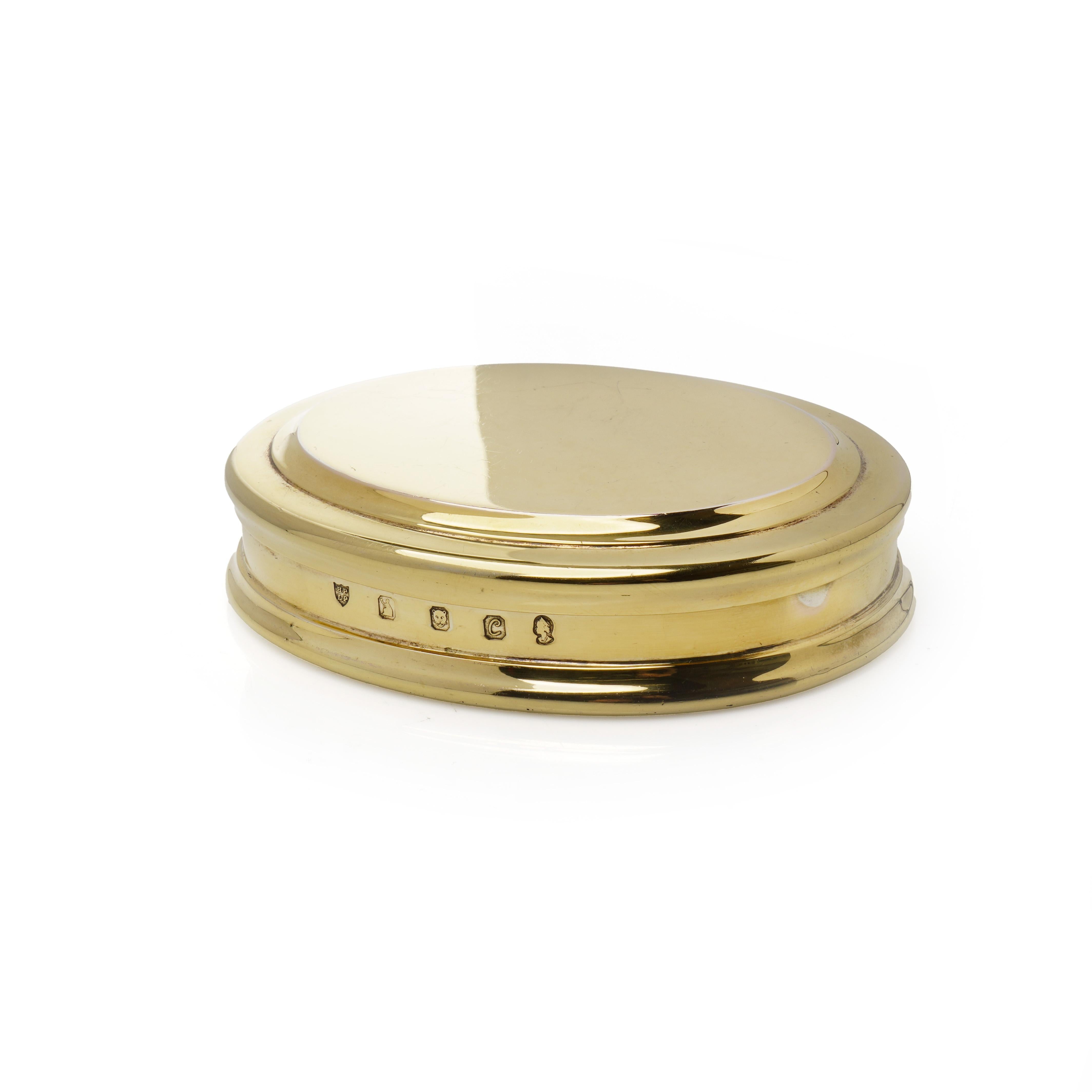 A refined vintage silver gilt jewellery box, crafted by Tessiers Ltd in 1977. This solid silver box is coated in a luxurious layer of gilding, giving it a rich golden hue. Designed with a smooth, domed lid and an elegant stepped base, this piece
