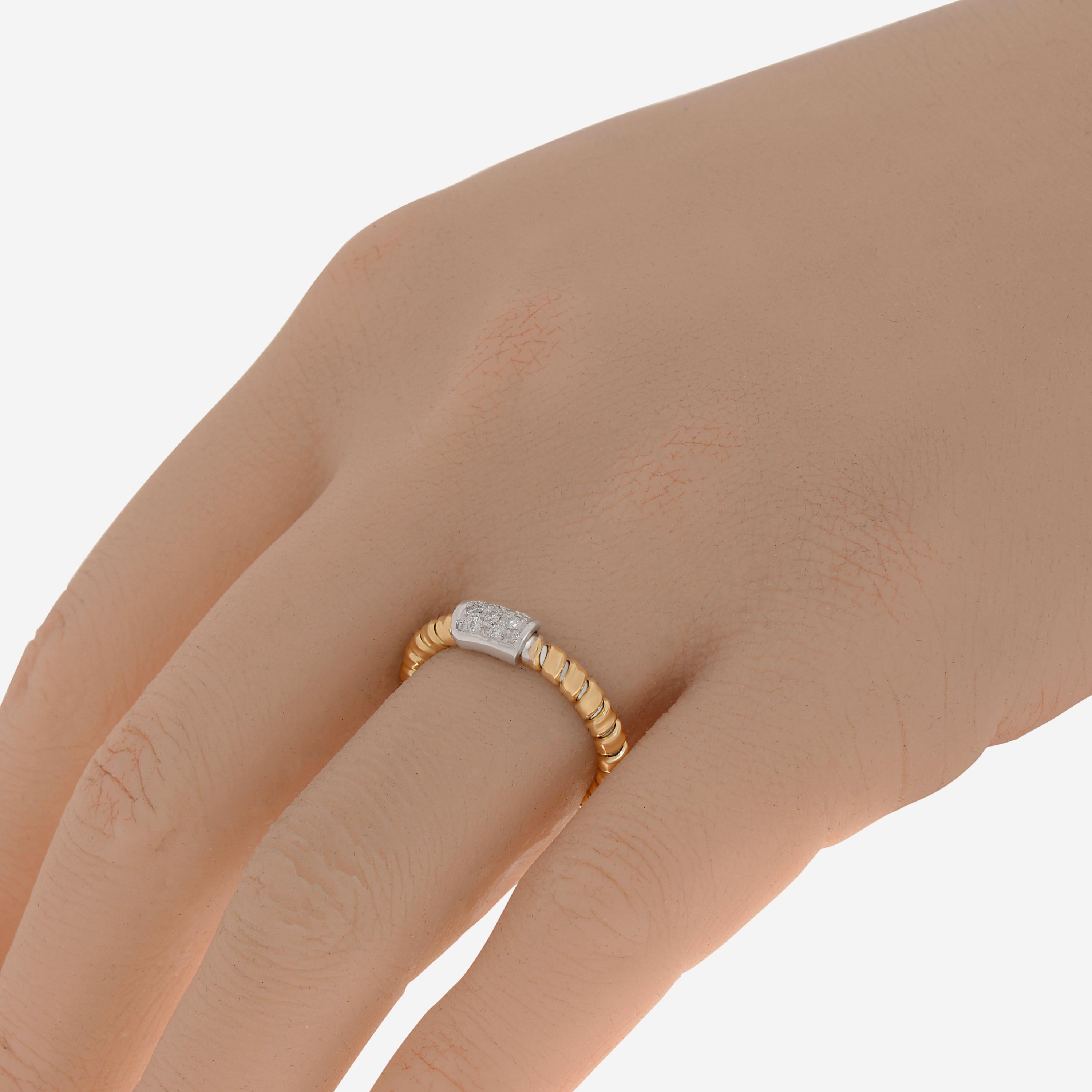Tessitore Tubogas 18K yellow gold band ring features traditional tubogas details set with 0.08ct. tw. diamonds. The ring size is 5.5 (50.6). The band width is 1/8