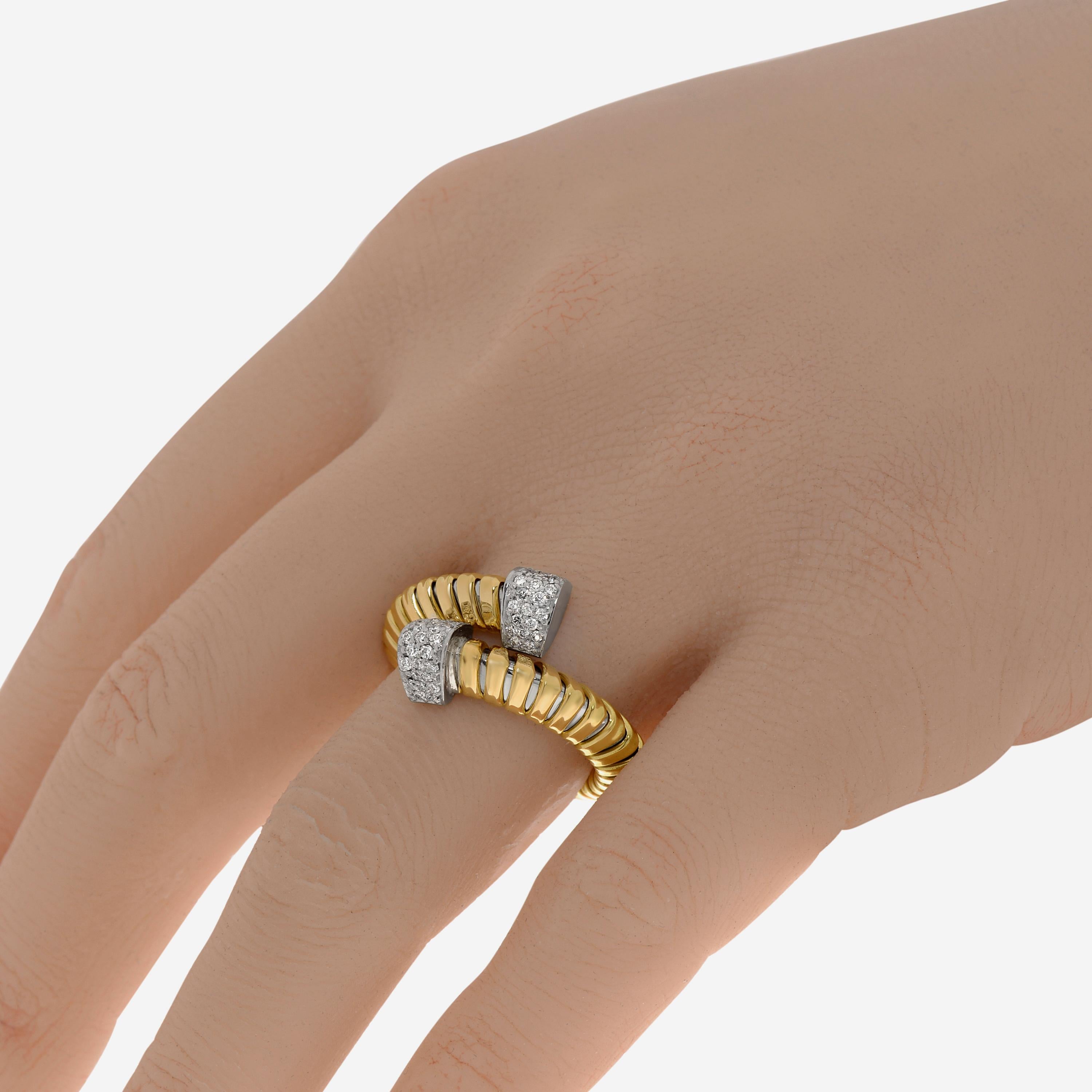 Tessitore Tubogas 18K yellow gold flexible ring features traditional tubogas details with 0.33ct. tw. diamonds. The ring size is 6.5 (53.1). The band width is 3/16
