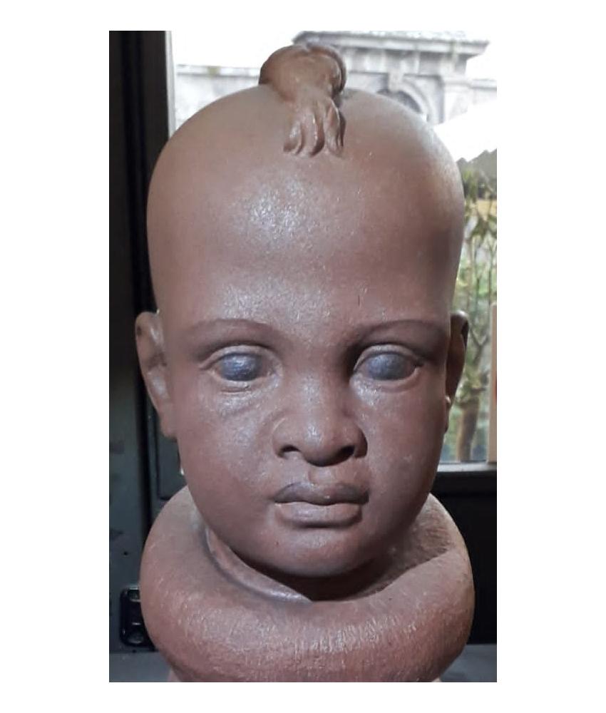 Italian Himba child head carved on red sandstone -made in Italy For Sale