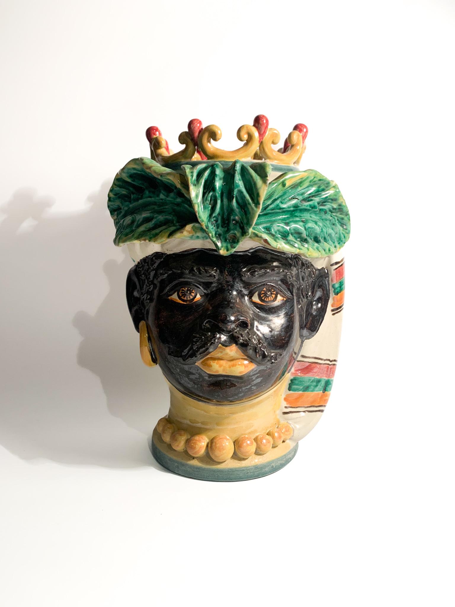 Moor's Head in Caltagirone Ceramics made by Giacomo Alessi in the 90s

Ø cm 21 h cm 30

Giacomo Alessi is an Italian master ceramist born in Caltagirone, Sicily, in 1957. He is one of the few registered Sicilian masters in the Book of Living Human