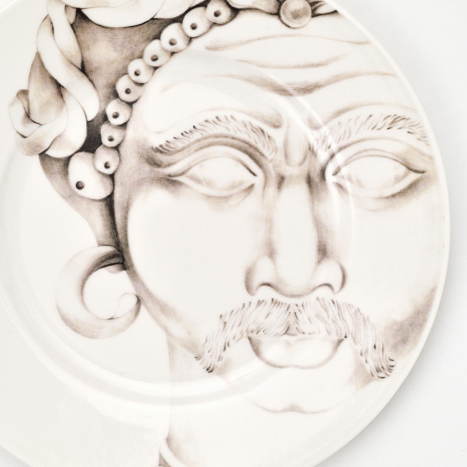 These captivating Alejandro dessert plate belongs to the Teste di Moro Collection of truly unique Italian dining ware. Inspired by the Sicilian Moor's Head tradition, these incredibly detailed plates are entirely handcrafted in refined porcelain.