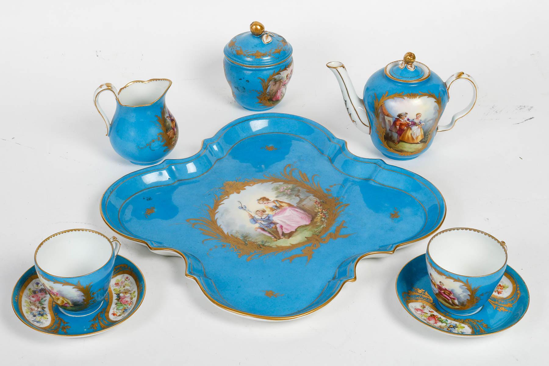 Tête-à-tête, Tea service, Sèvres porcelain, Napoleon III period.

Tea service, tête-à-tête in 19th century Sèvres porcelain, Napoleon III period, rich painted and gilded decoration on a sky blue background, comprising a teapot, a pot-à-lait, a sugar