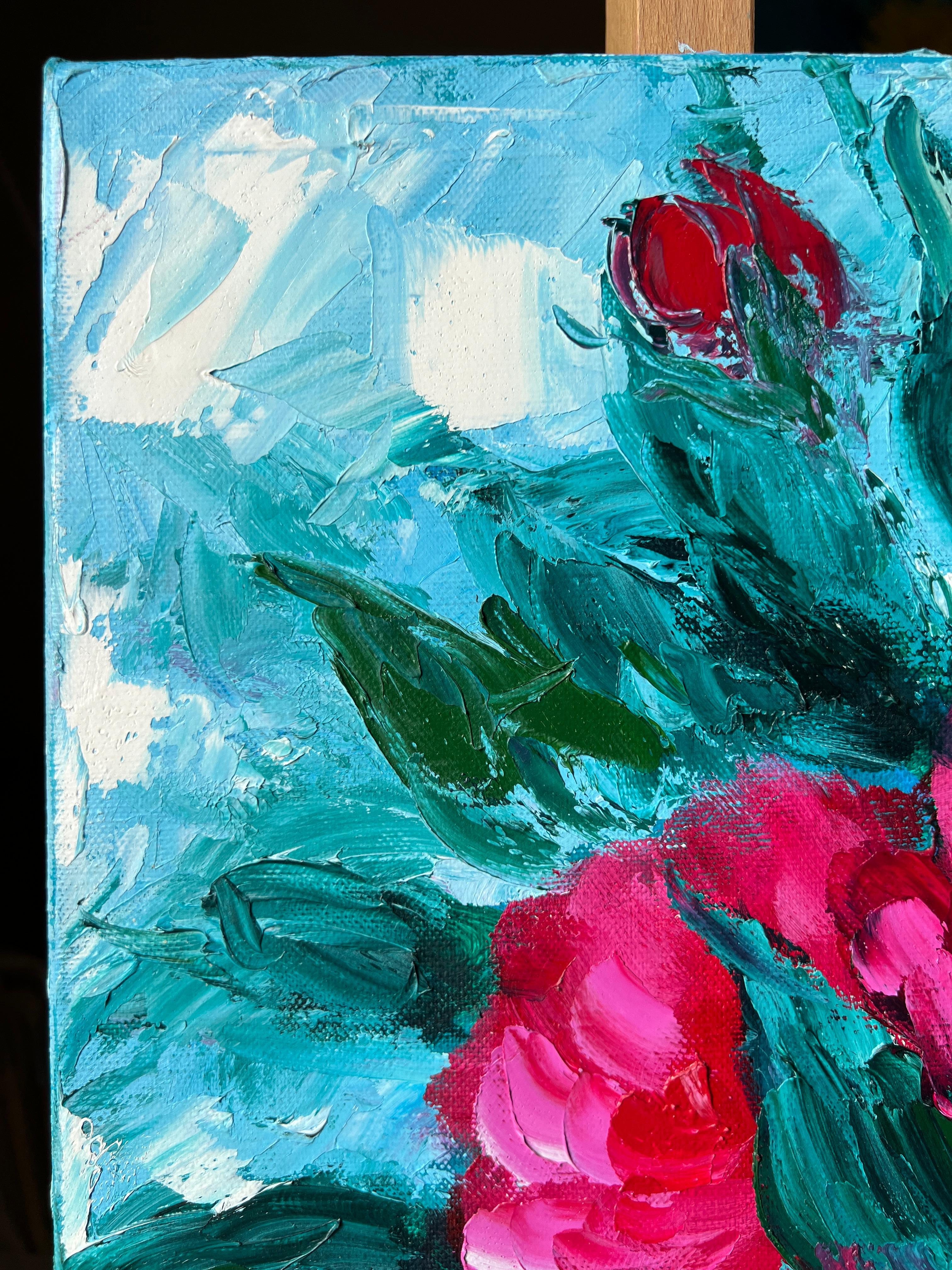 On a tranquil blue background, raspberry roses, resembling peonies, are painted with textured brushstrokes in oil paint. The harmonious, calm, and refined combination of the blue background, green leaves, and dark raspberry flowers creates a