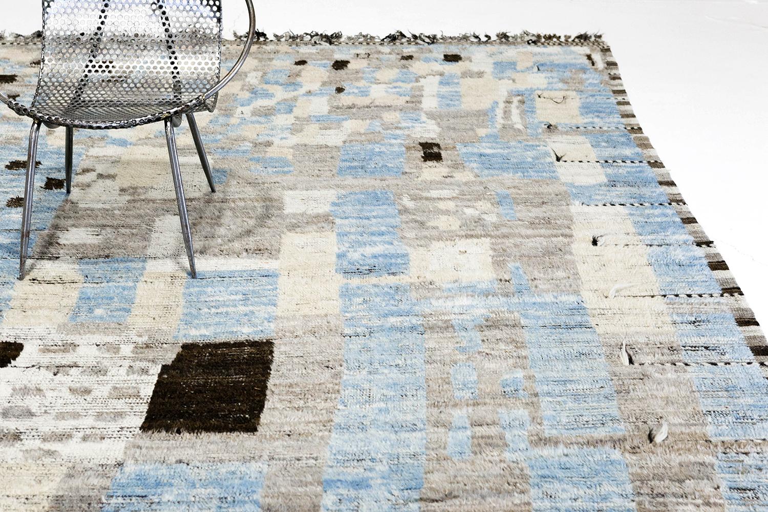 'Tetouan' is a beautifully textured wool shag combining unique design elements for the modern design world. Its weaving of natural earth tones wuth vibrant blues and playfulness with shapes is suitable for many interiors and is what makes the Atlas