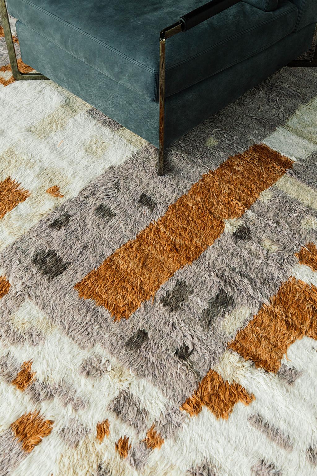 This abstract handwoven rug is made of wool with saturated colors and interesting irregular design motifs inspired by Moroccan Azilals recreated for the modern design world. Design in Los Angeles with care.



Rug Number 28135
Size 9' 3