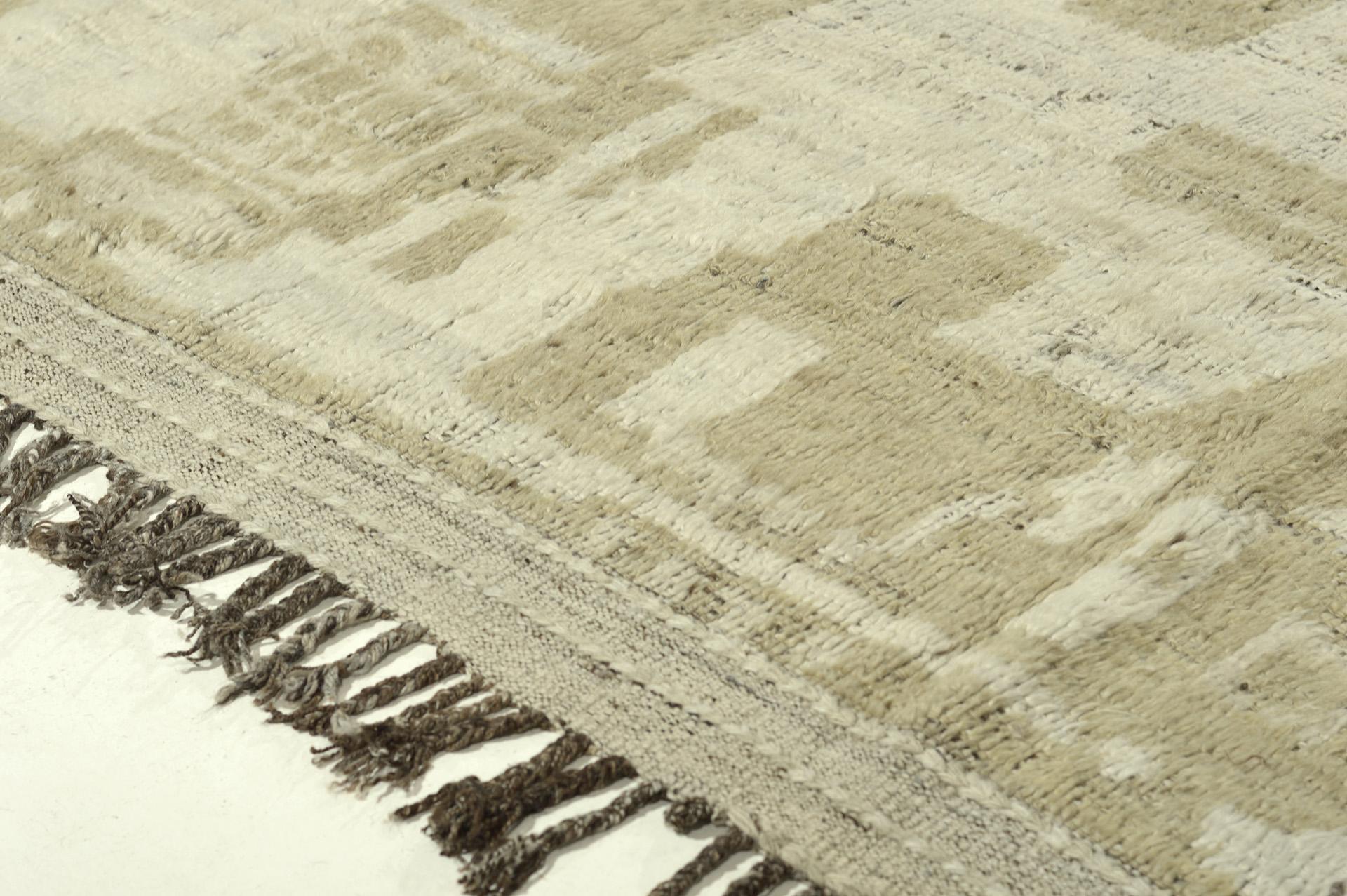 This natural earth toned rug is a modern interpretation of a Moroccan Azilal. Handwoven wool of shades of off white and light beige make for an easy interior pairing with interest in irregular patterns. 



Rug number 28168
Size 9' 3