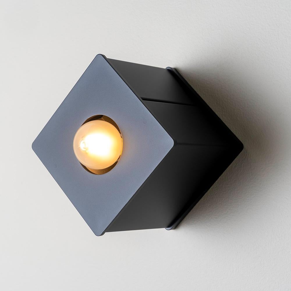 The Tetra I embodies contemporary elegance as a flush mount lighting fixture with bold, striking geometry and a hint of playfulness. Inspired by 90s puzzle video games, the Tetra I invites the user to play with the object’s orientation and
