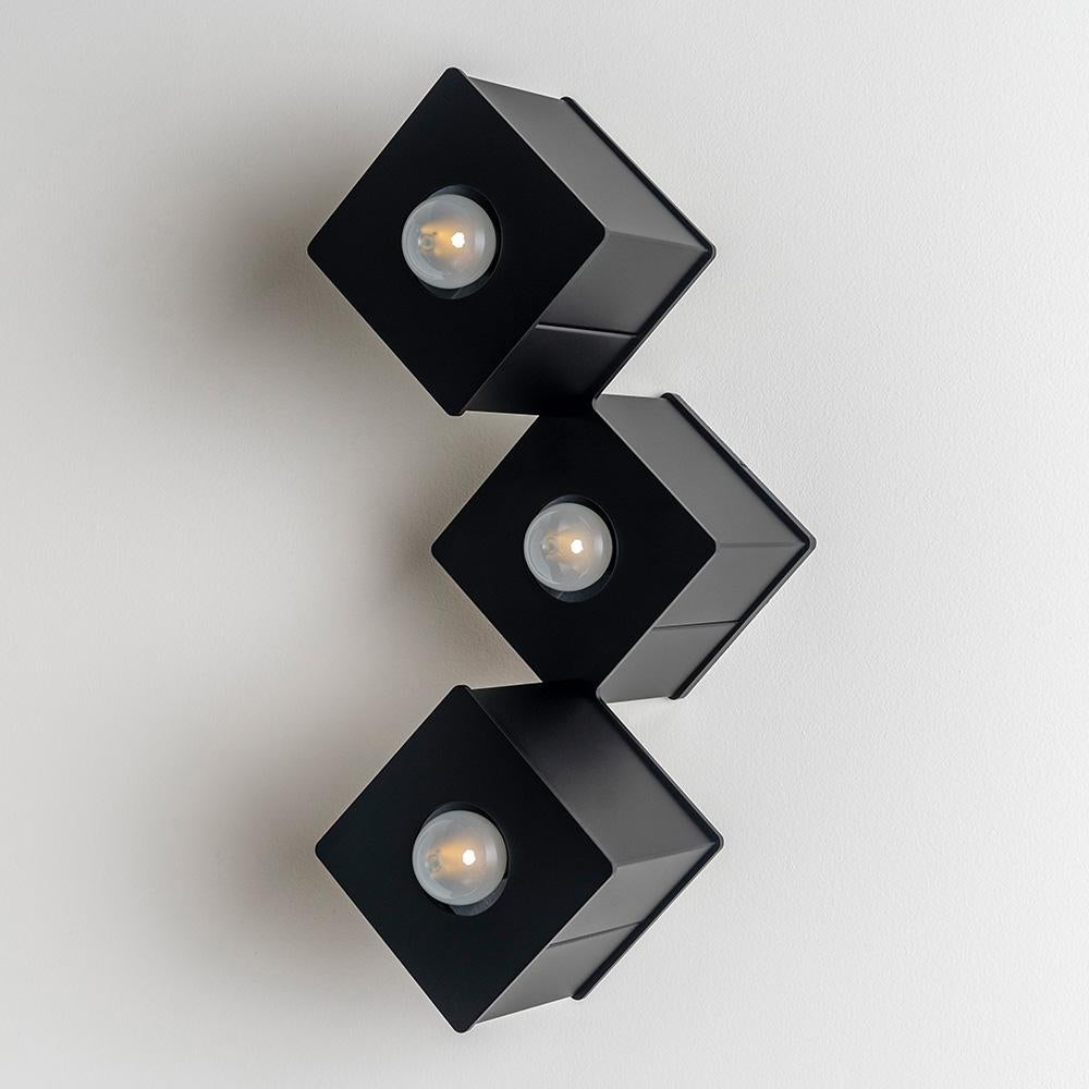The Tetra III embodies contemporary elegance as a flush mount lighting fixture with striking geometry and a hint of playfulness. Inspired by 90s puzzle video games, the Tetra III invites the user to play with the object’s orientation whether mounted
