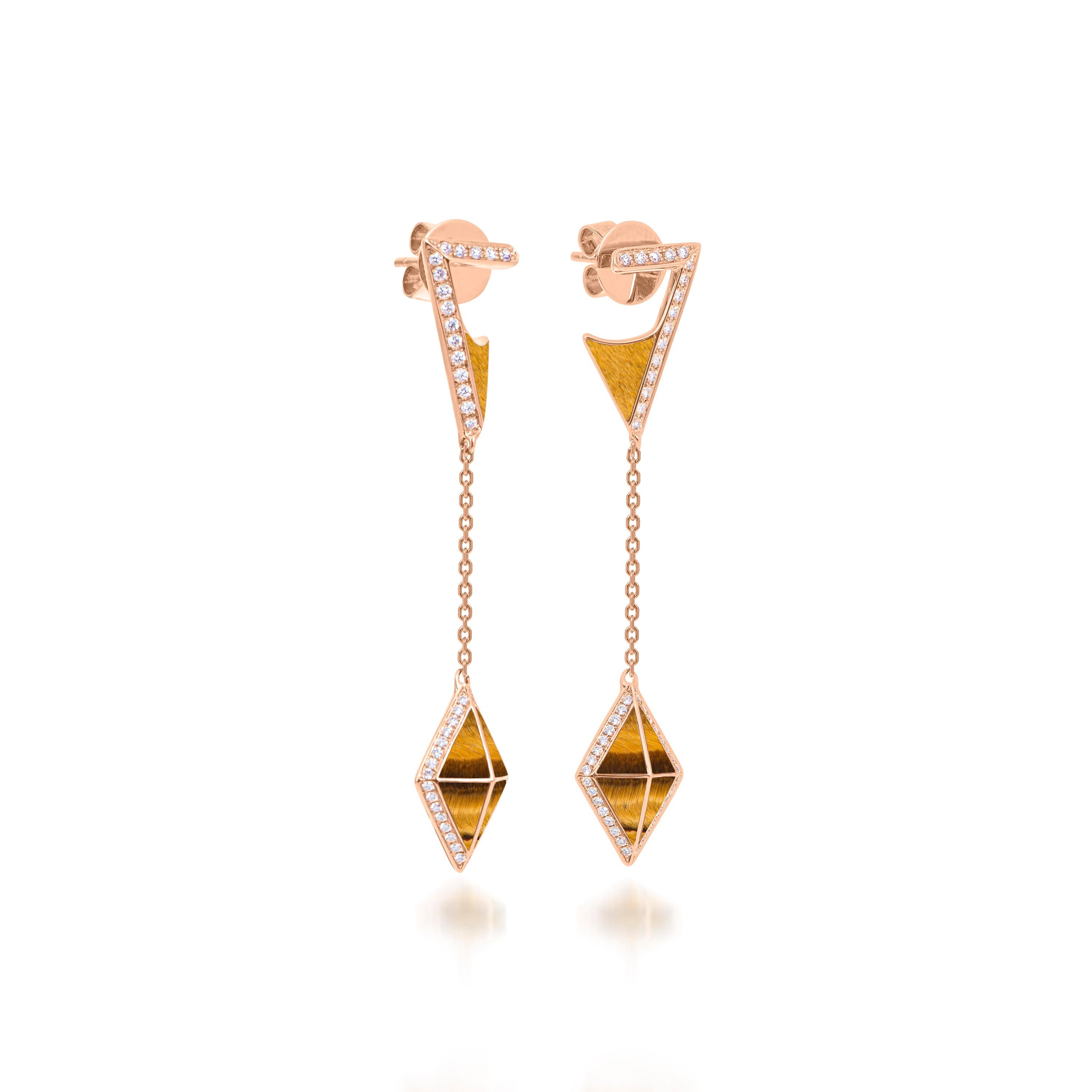 Through graphic, contemporary lines, Butani’s Tetra collection celebrates the beauty of symmetry while reimagining classic motifs of the past. 

Flowing from the ear towards the shoulders with finesse, these graceful drop earrings celebrate the