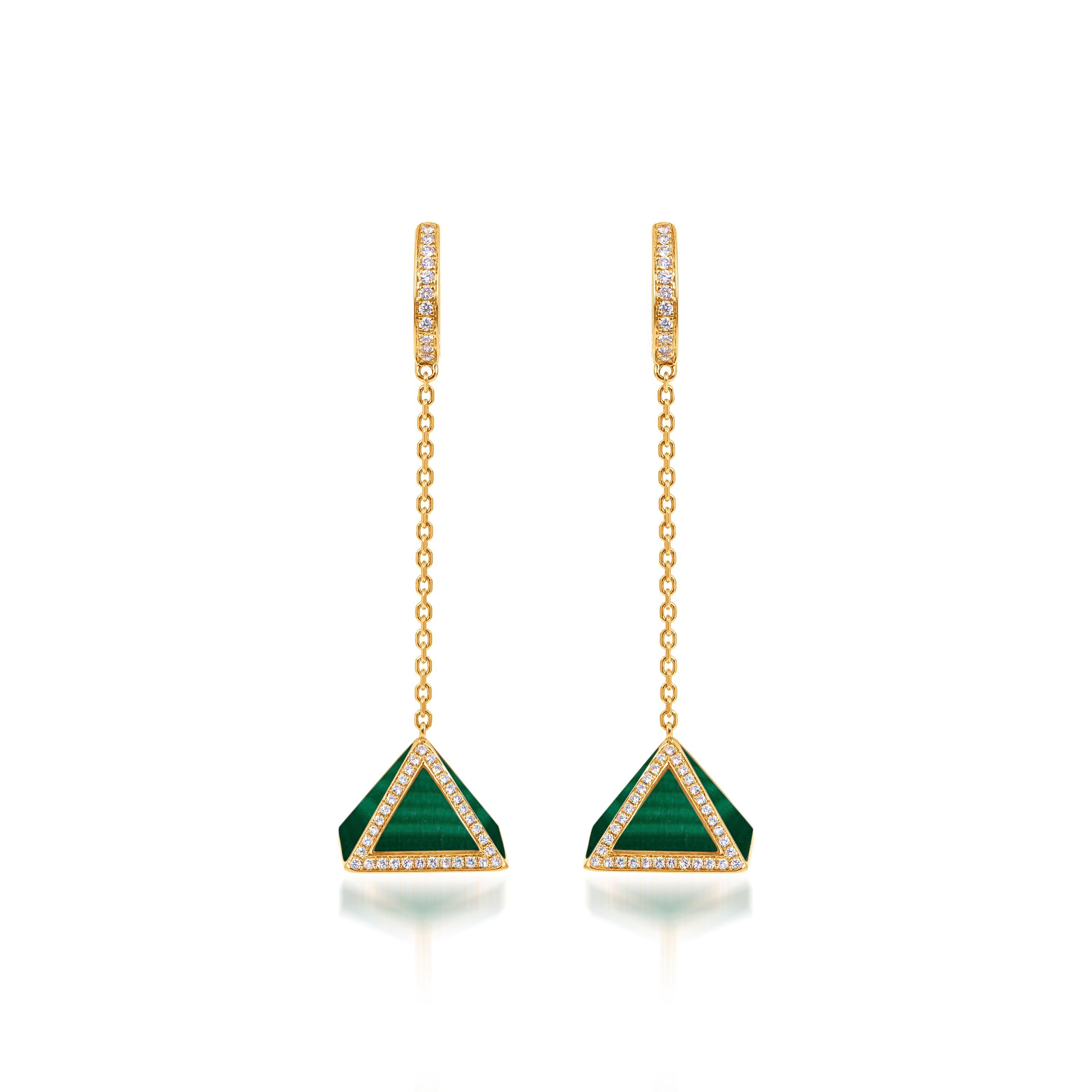 Through graphic, contemporary lines, Butani’s Tetra collection celebrates the beauty of symmetry while reimagining classic motifs of the past. 

Inspired by the strength and stability of pyramids, the Tetra Tribus Earrings drop gracefully below the