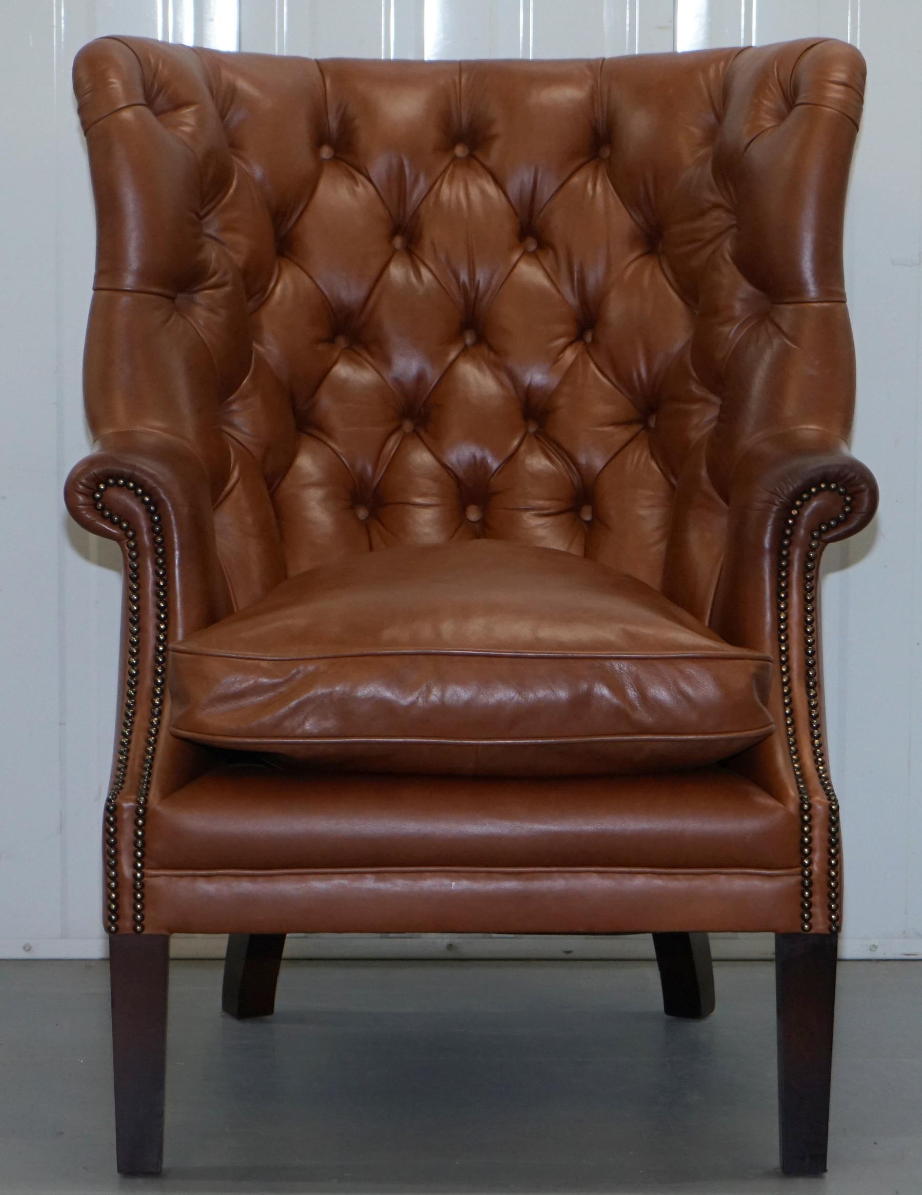 We are delighted to offer for auction this lovely Tetrad Bradley Wingback Porters Chesterfield buttoned brown leather armchair RRP £1860

Tetrad Upholstery Bradley high back wing chair. This classic superbly comfortable wing chair with an extra