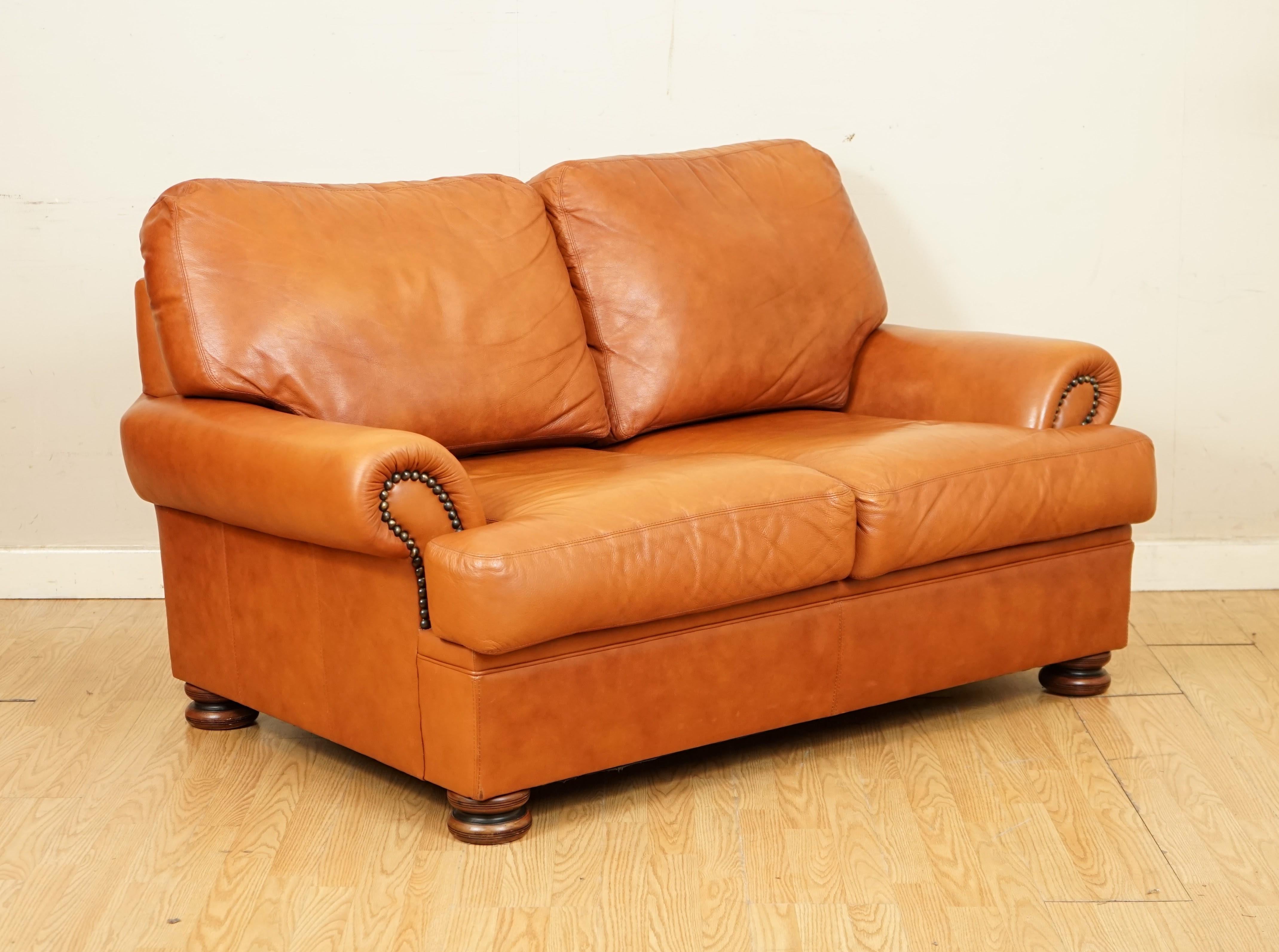 We are so excited to present to you this Tetrad Cordoba two seater leather sofa.

A very solid, well made and compact sofa that fits anywhere you want in your home.

We have lightly restored this by giving it a hand clean all over, hand waxed
