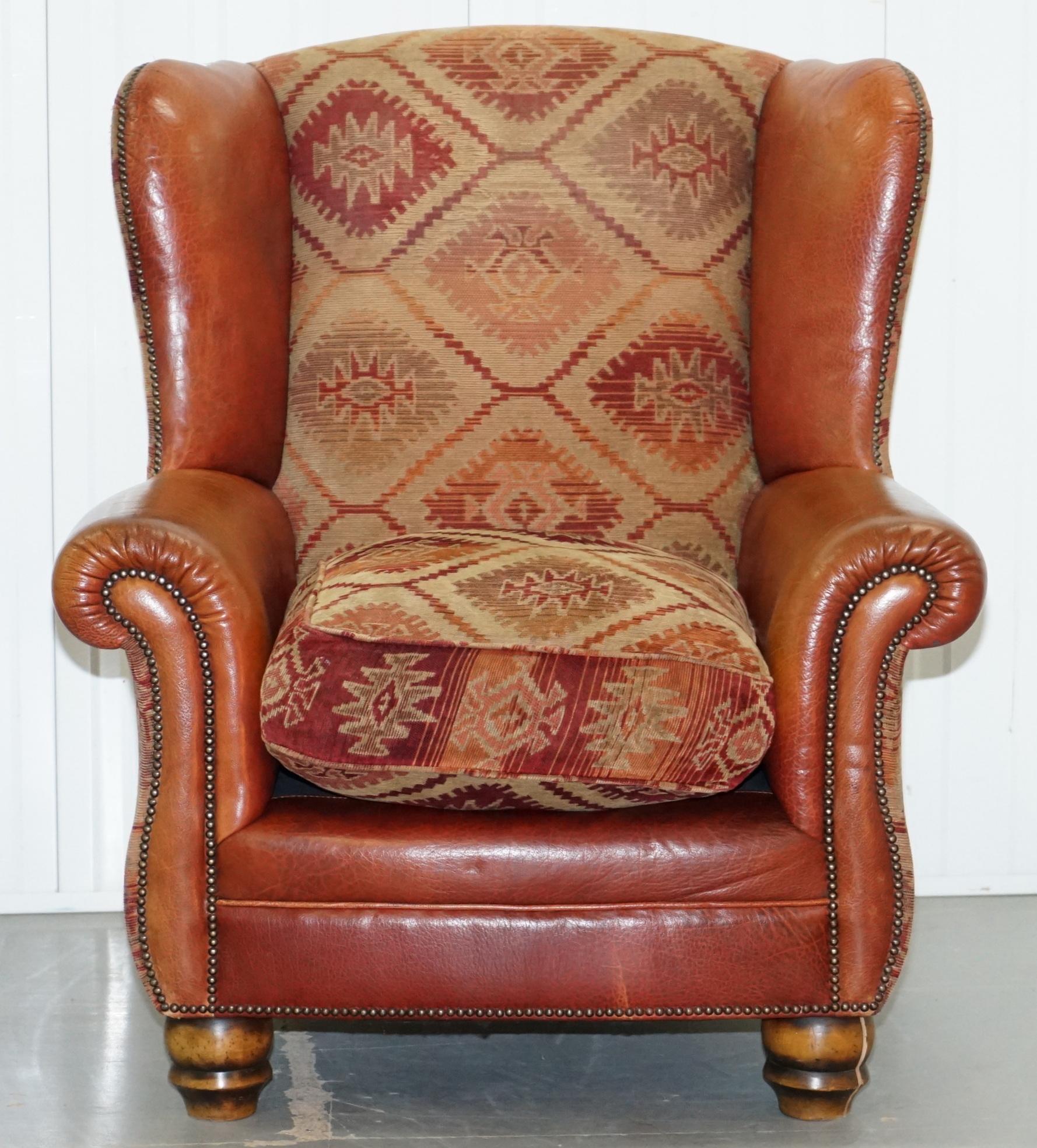 We are delighted to offer for sale this really lovely hand made in England Tetrad Eastwood brown leather armchair with Kilim upholstery RRP £1696.

The chair has a thick feather filled cushion, buffalo leather upholstery, the Kilim is thick and
