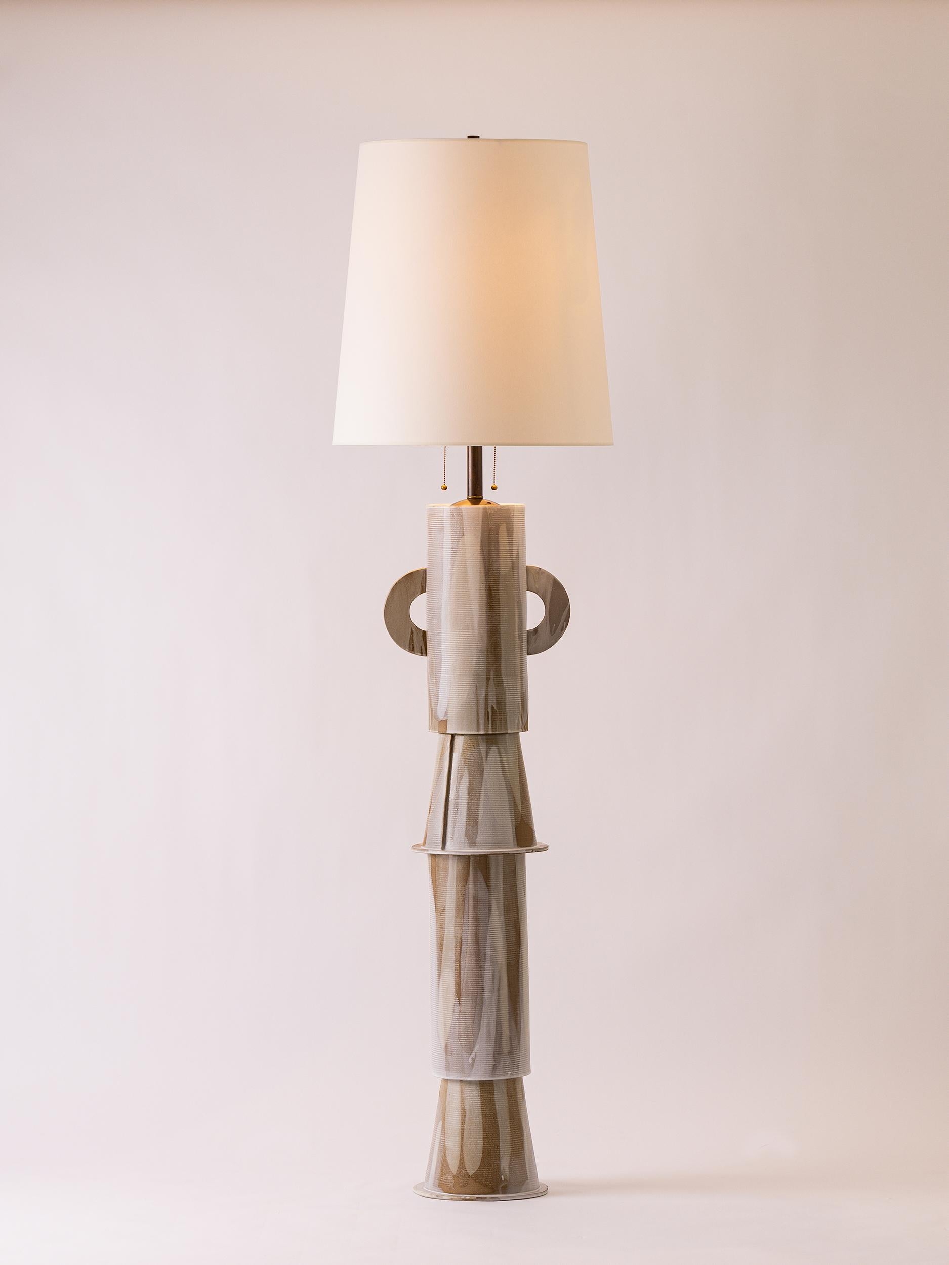 FINISH

- Parchment & chalk poured glaze 
- Antique brass fittings
- Beige-cloth cord
- Double cluster socket
- Archival paper shade 

BULB

Tala Sphere I Bulb included
E26 / 110-120V / 3.8W
2000-2800K dim to warm light

DIMENSIONS

Lamp Height –