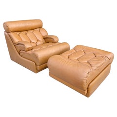 Tetrad Solo Sillón y otomana de cuero de los años 70