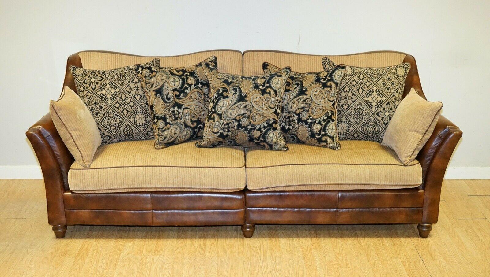 We are delighted to sell this very comfortable Tetrad style leather & fabric sofa.
The scatter pillows have all been replaced with new ones bought from John Lewis.
The best thing about this sofa is that it gives you great comfort and also saves