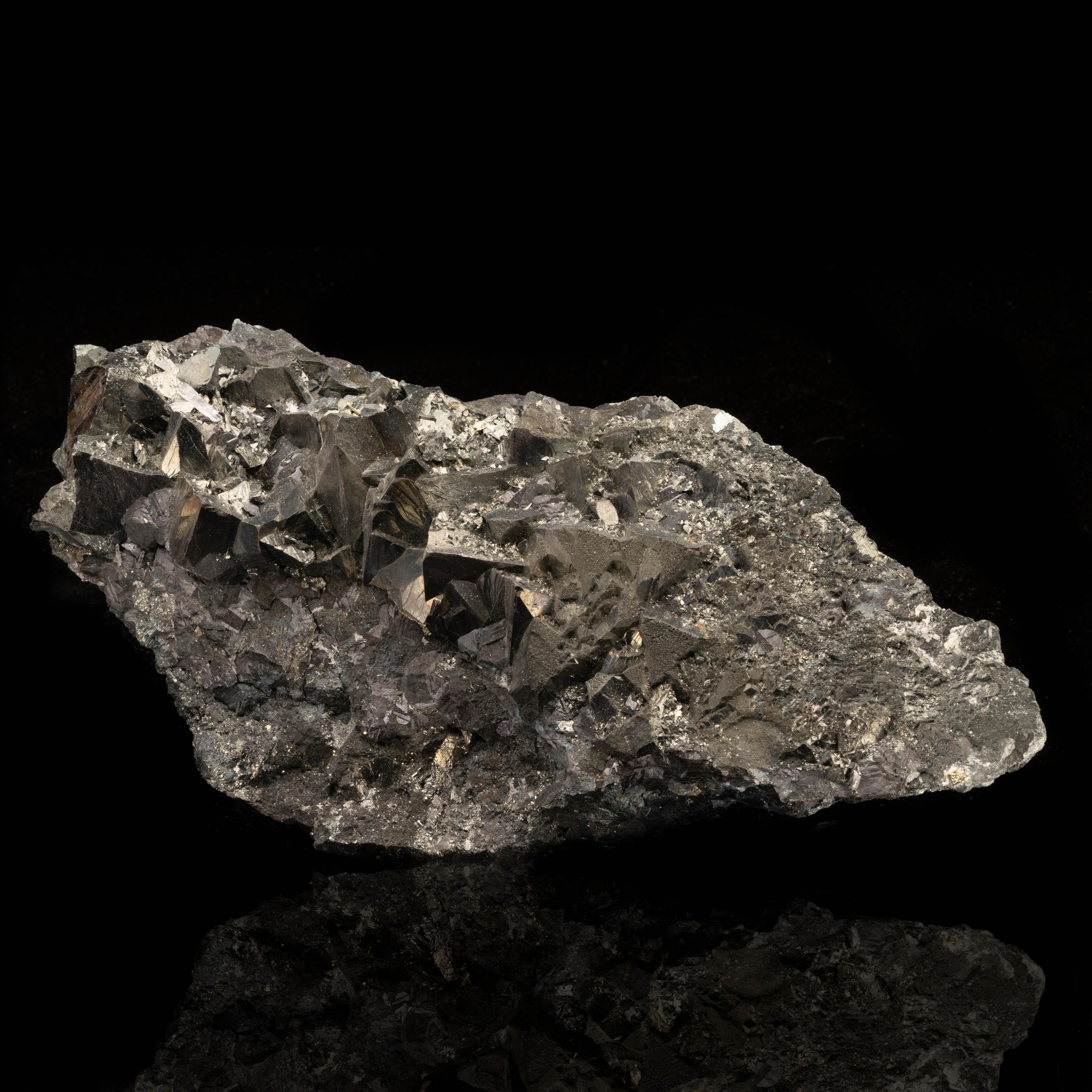 Named for the unique and geometrically fascinating tetradron shape of its crystals, this important ore of copper – also an ore of silver – crystallizes or forms masses in metalliferous hydrothermal veins. Fine tetrahedrites like this large specimen