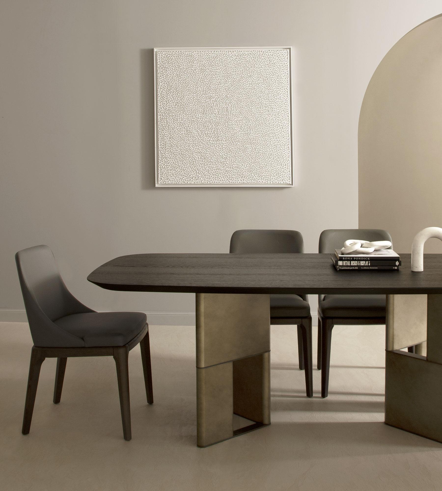 Tetris Laguna Oak and Bronze Dining Table, 10 Seats, by Morica Design
Dimensions: D 120 x W 300 x H 75 cm.
Materials: Laguna oak, oxidized bronze, dark burnished metal.

Available in 6, 8, or 10 seats.
Available in Canaletto Walnut, Laguna Oak, and