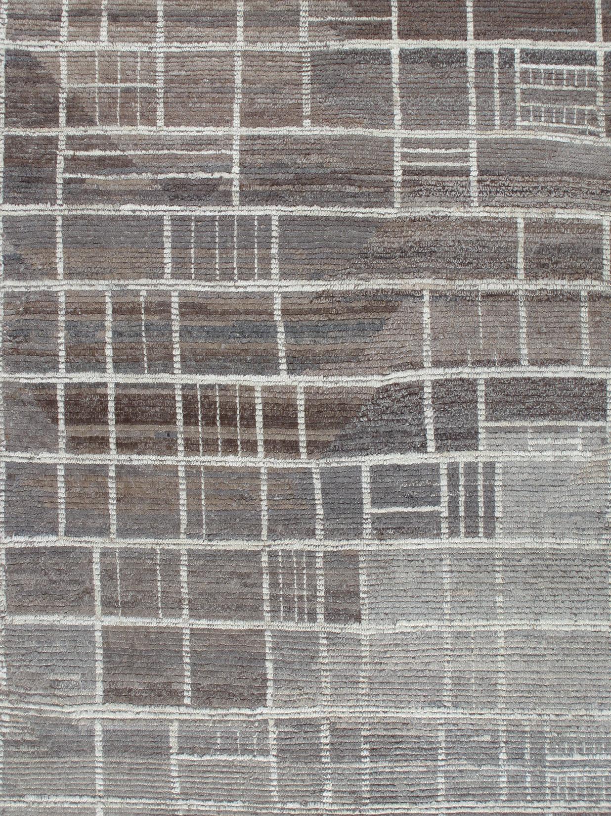 Our Tetris rug is handknotted from the finest, hand-carded, hand-spun, natural wool. The earthy natural tones woven with cool grey shades offer a perfect balance to any room. Available in custom colors and sizes upon request.