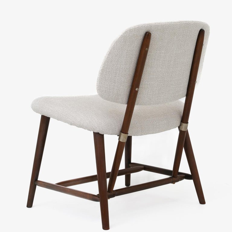 Model 'Teve' - easy chair with teak frame and new, light textile (Ecriture 210). Alf Svensson / Ljungs Industrier.
