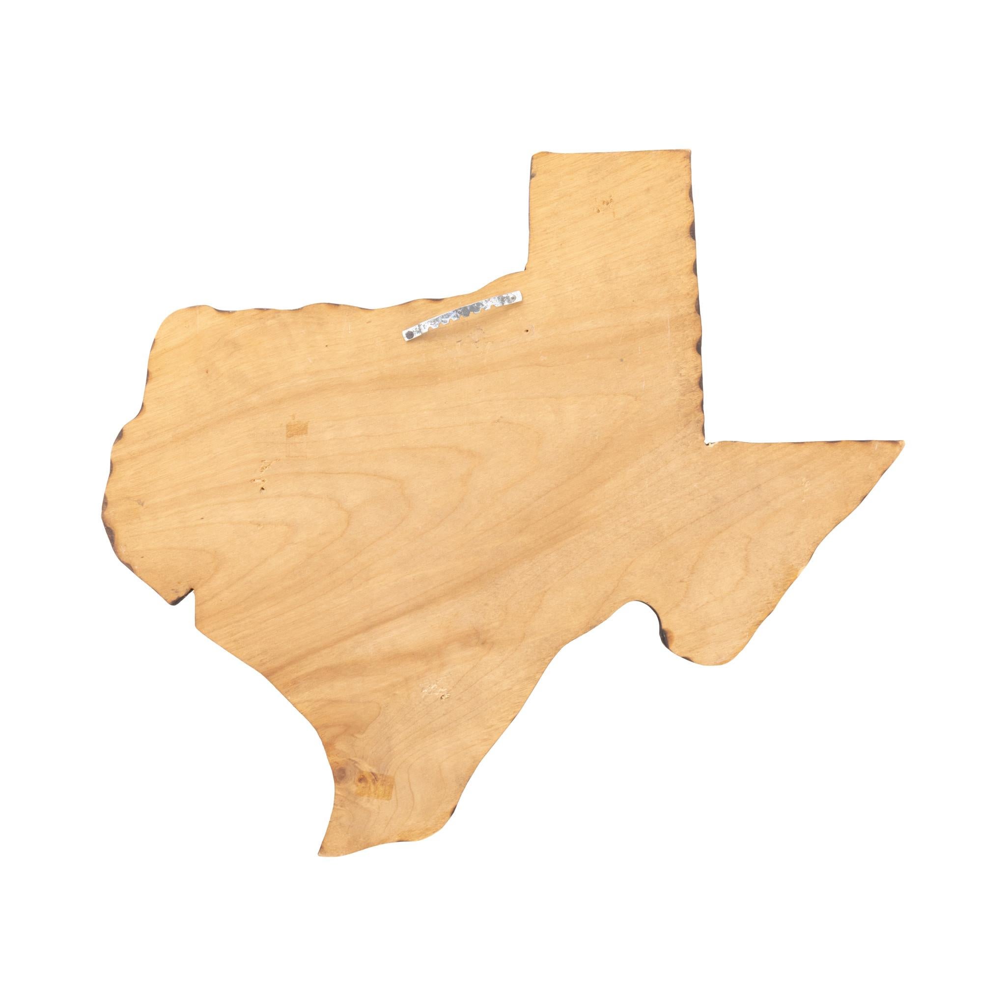 Présentoir de fils barbelés en forme de Texas. Découpe en bois du Texas avec 22 variétés différentes de fil de fer barbelé, chacune étiquetée avec le nom et l'année du brevet. Encadrement extérieur avec bord en bois festonné. Marqué en bas 