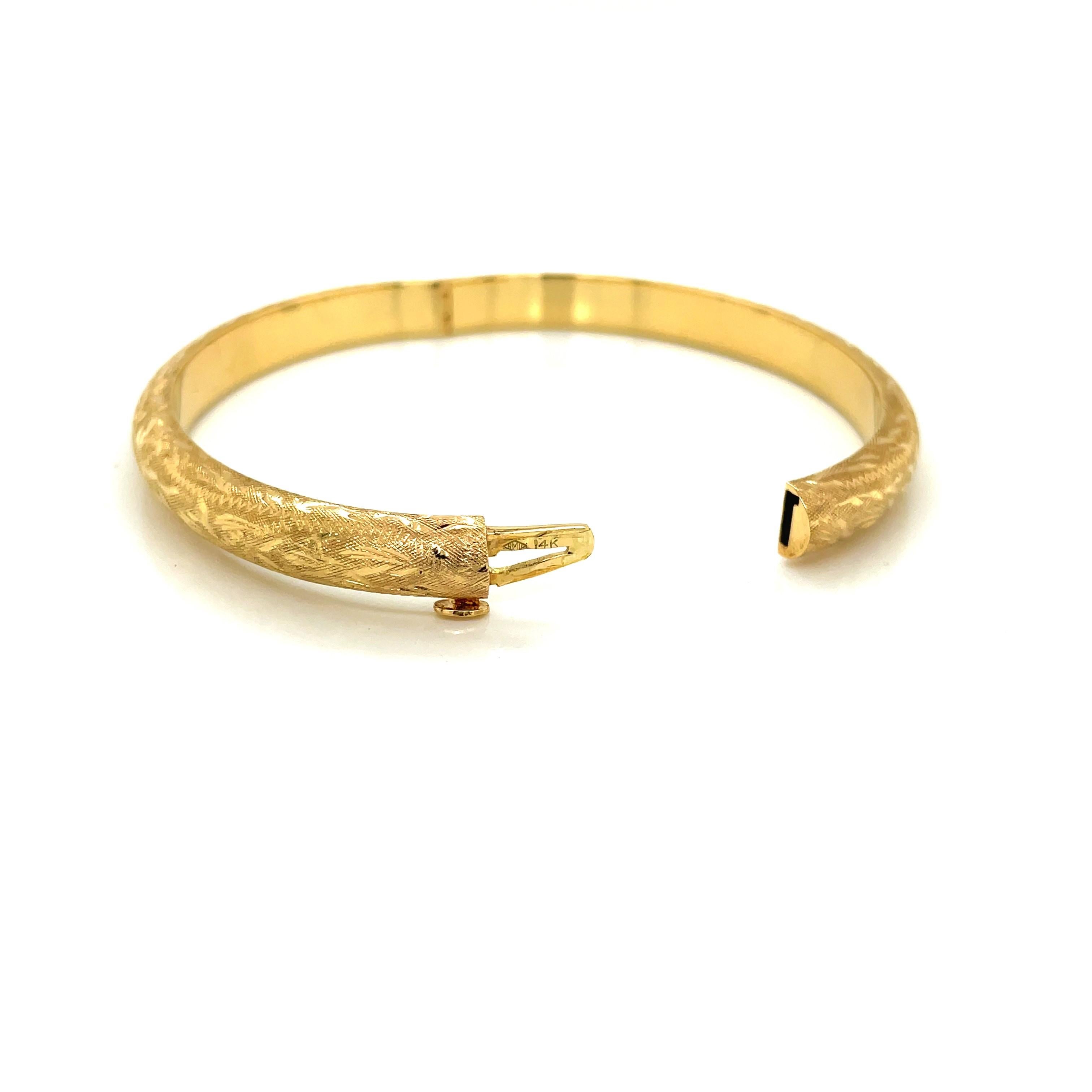 Women's Textured 14 Karat Yellow Gold Hinged Bangle Bracelet