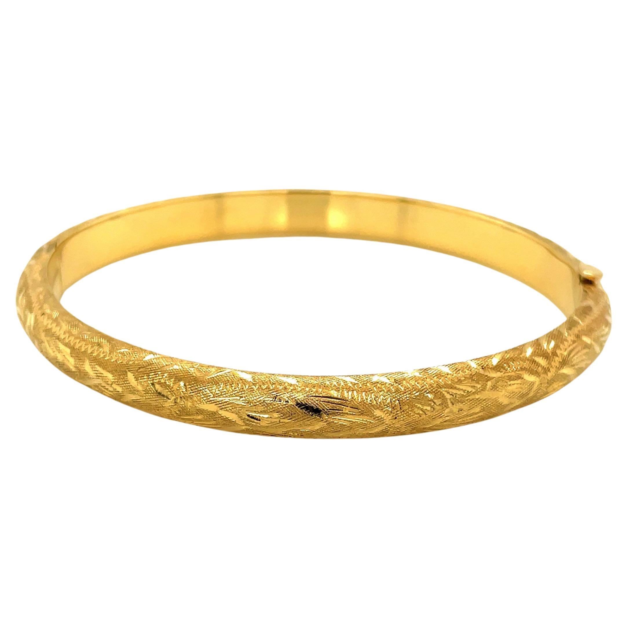 Textured 14 Karat Yellow Gold Hinged Bangle Bracelet