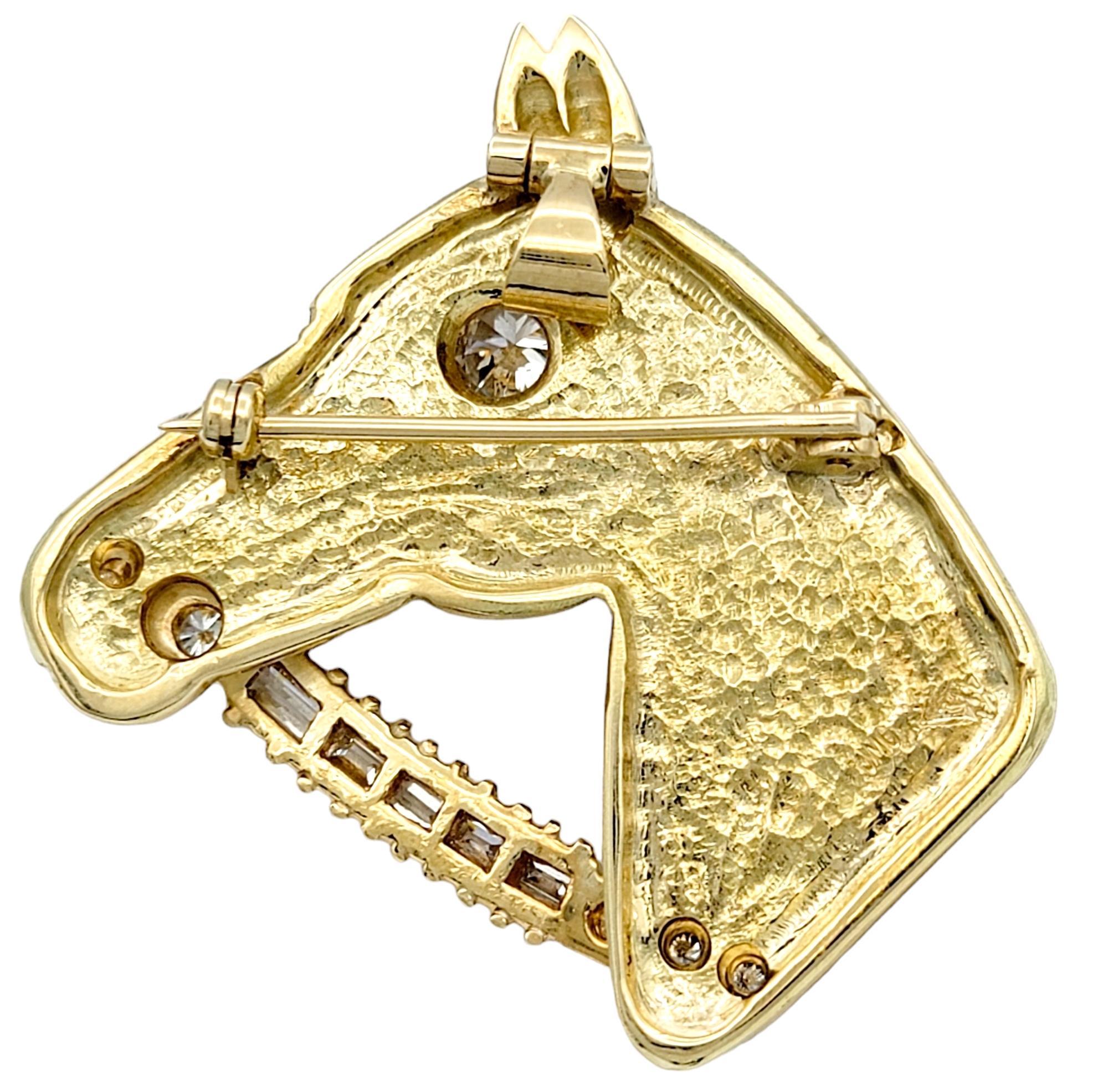 This exquisite equestrian themed piece, crafted from 14 karat yellow gold, elegantly showcases a wonderfully detailed horse head profile. Beautifully glistening as the steed's discerning eye is a single round brilliant-cut diamond, lending a
