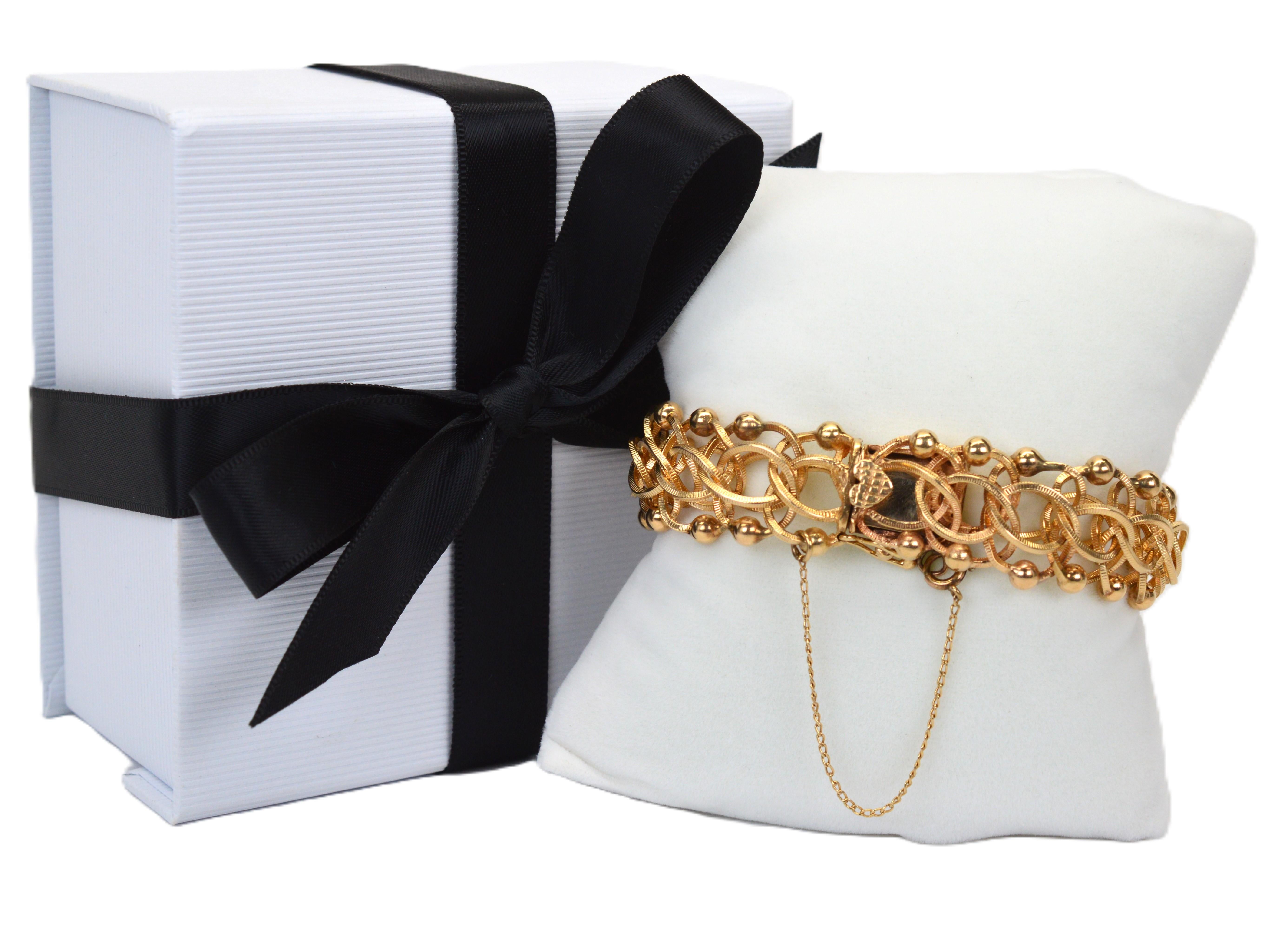 Bracciale a catena aperta a maglie intrecciate in oro giallo 14 kt. in vendita 5