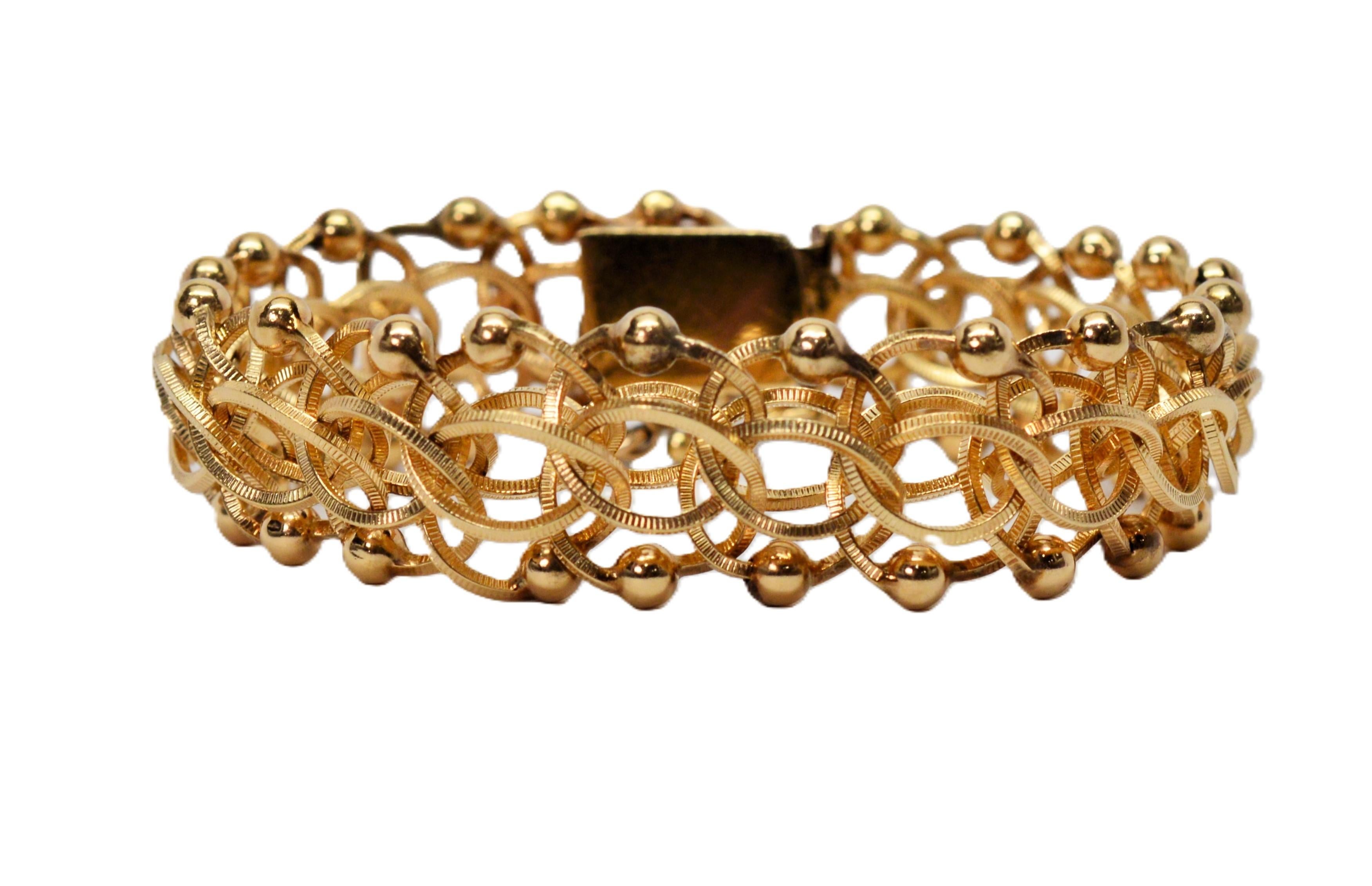 Bracciale a catena aperta a maglie intrecciate in oro giallo 14 kt. In condizioni ottime in vendita a Mount Kisco, NY