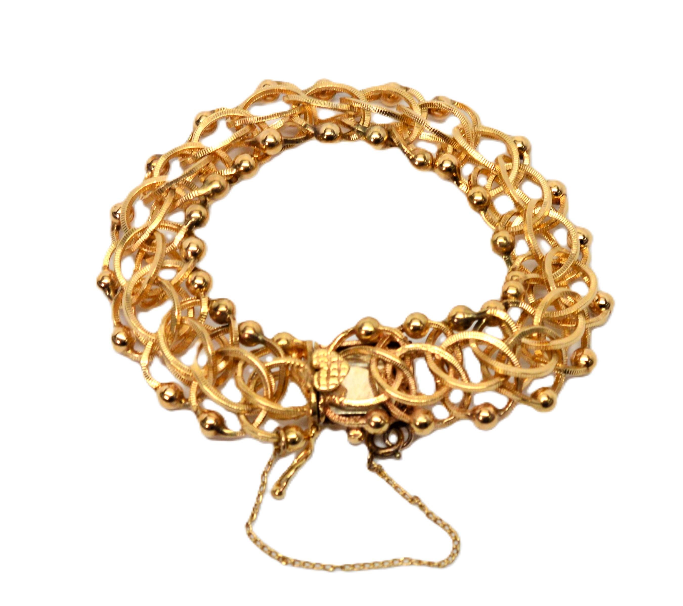 Bracciale a catena aperta a maglie intrecciate in oro giallo 14 kt. in vendita 2