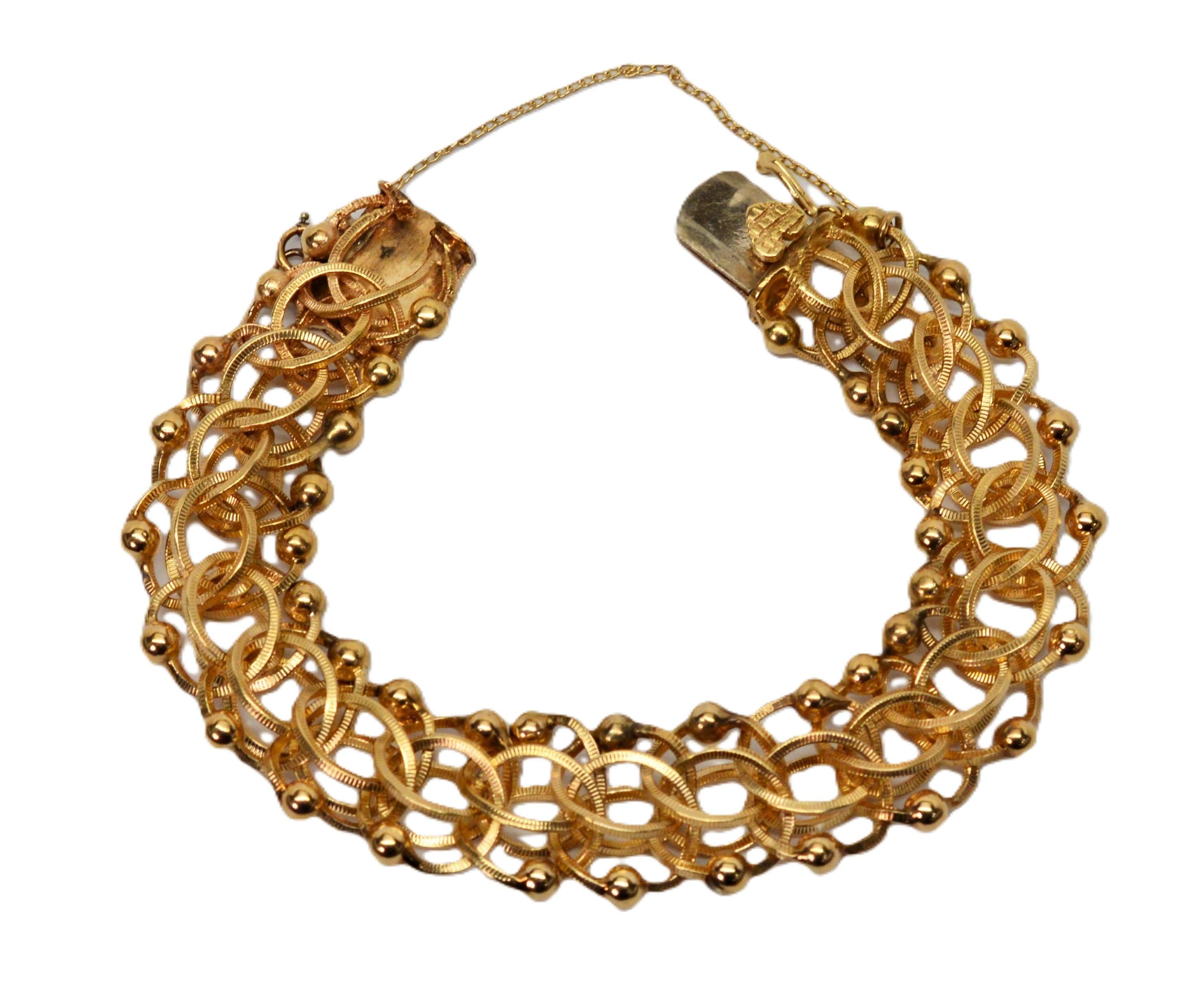 Bracciale a catena aperta a maglie intrecciate in oro giallo 14 kt. in vendita 3