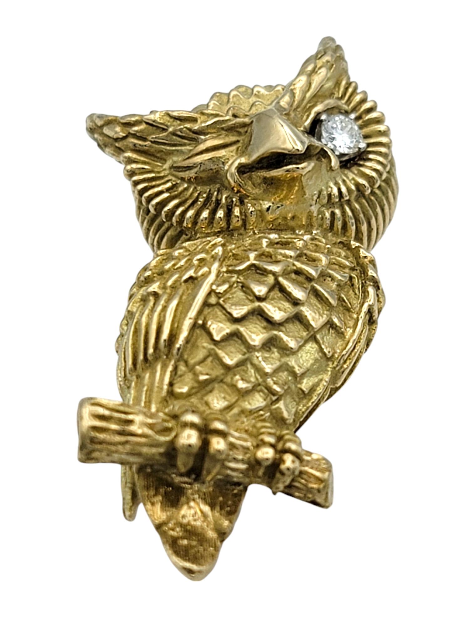 Add a whimsical touch of charm to your collection with this enchanting winking owl brooch. Crafted in radiant 14 karat yellow gold, this brooch is a masterpiece of intricate detail, capturing the textured feathers and playful personality of this