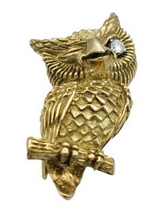 Textured 14 Karat Yellow Gold Winking Owl Brooch with Round Diamond Eye