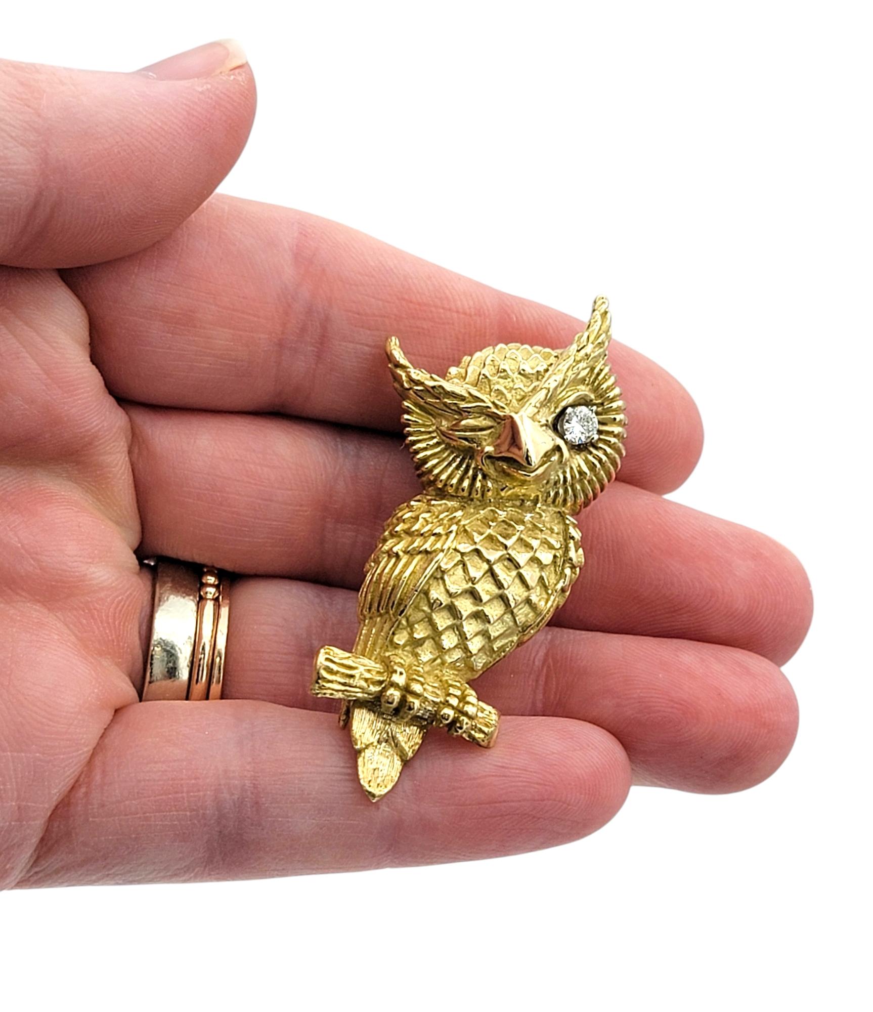 Textured 14 Karat Yellow Gold Winking Owl Brooch with Round Diamond Eye For Sale 1