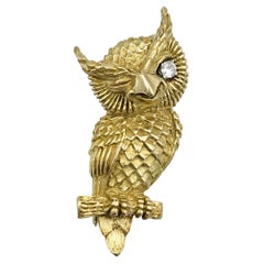 Textured 14 Karat Yellow Gold Winking Owl Brooch with Round Diamond Eye