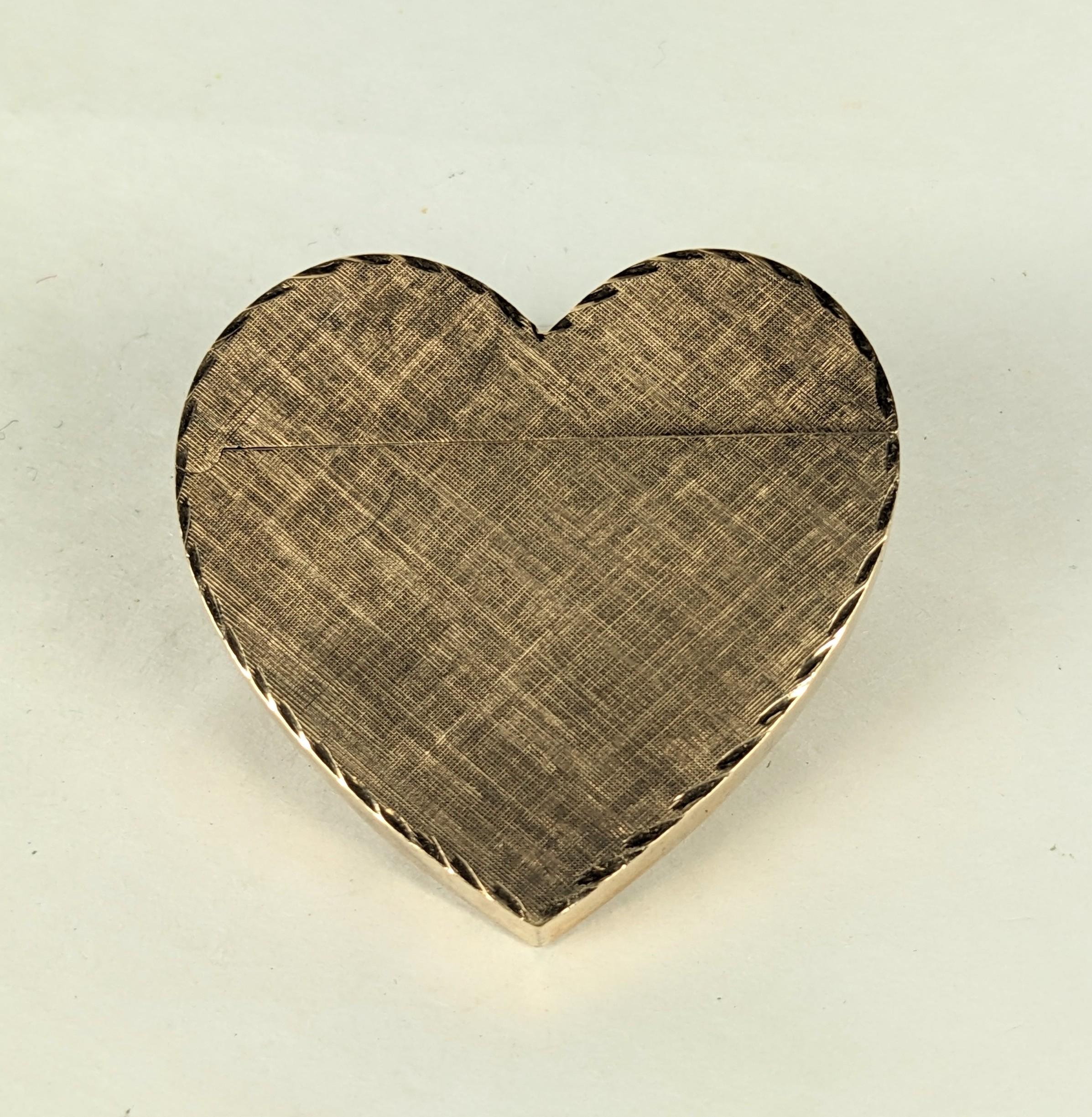 Charming Textured 14k Gold Heart Form Lighter from the 1960's. Unsigned but tested as 14k gold. 1960's USA. 1.5