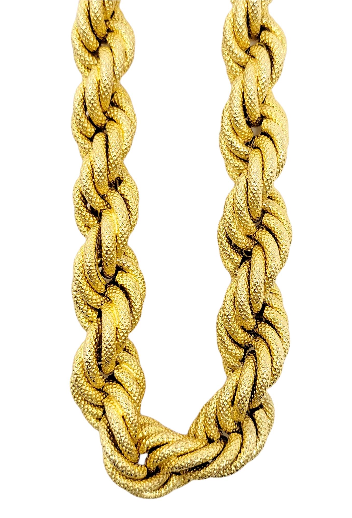 Luxurious yellow gold rope link necklace will stand the test of time. The classic design gently hugs the neck and exudes a sophisticated elegance. Featuring a twisted rope motif with a textured finish, the graduated design is slightly chunky in