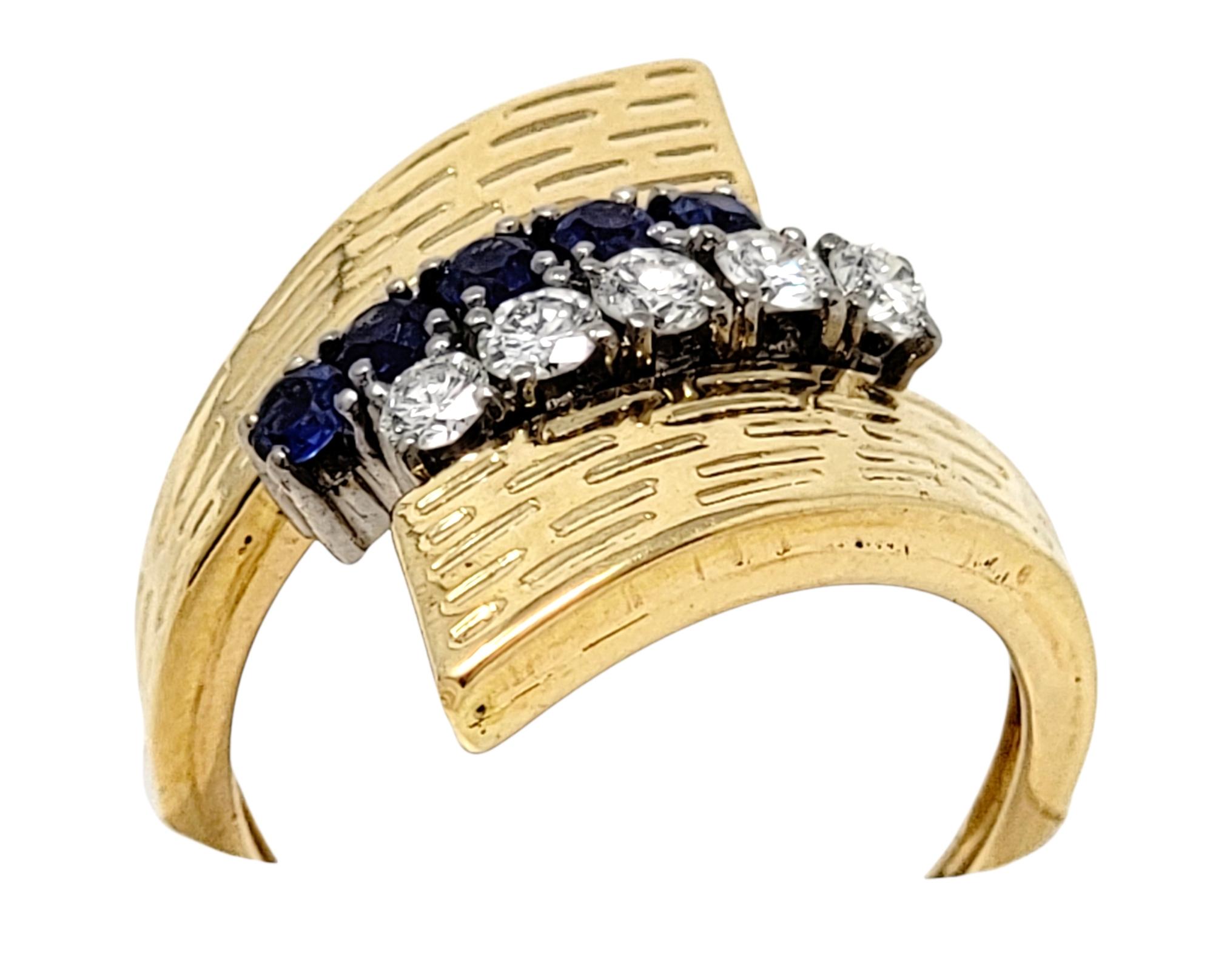 Women's Textured 18 Karat Yellow Gold Wrap Ring with Natural Sapphires and Diamonds For Sale
