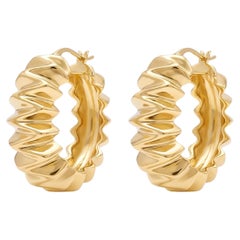Aros texturizados de oro amarillo macizo de 18k