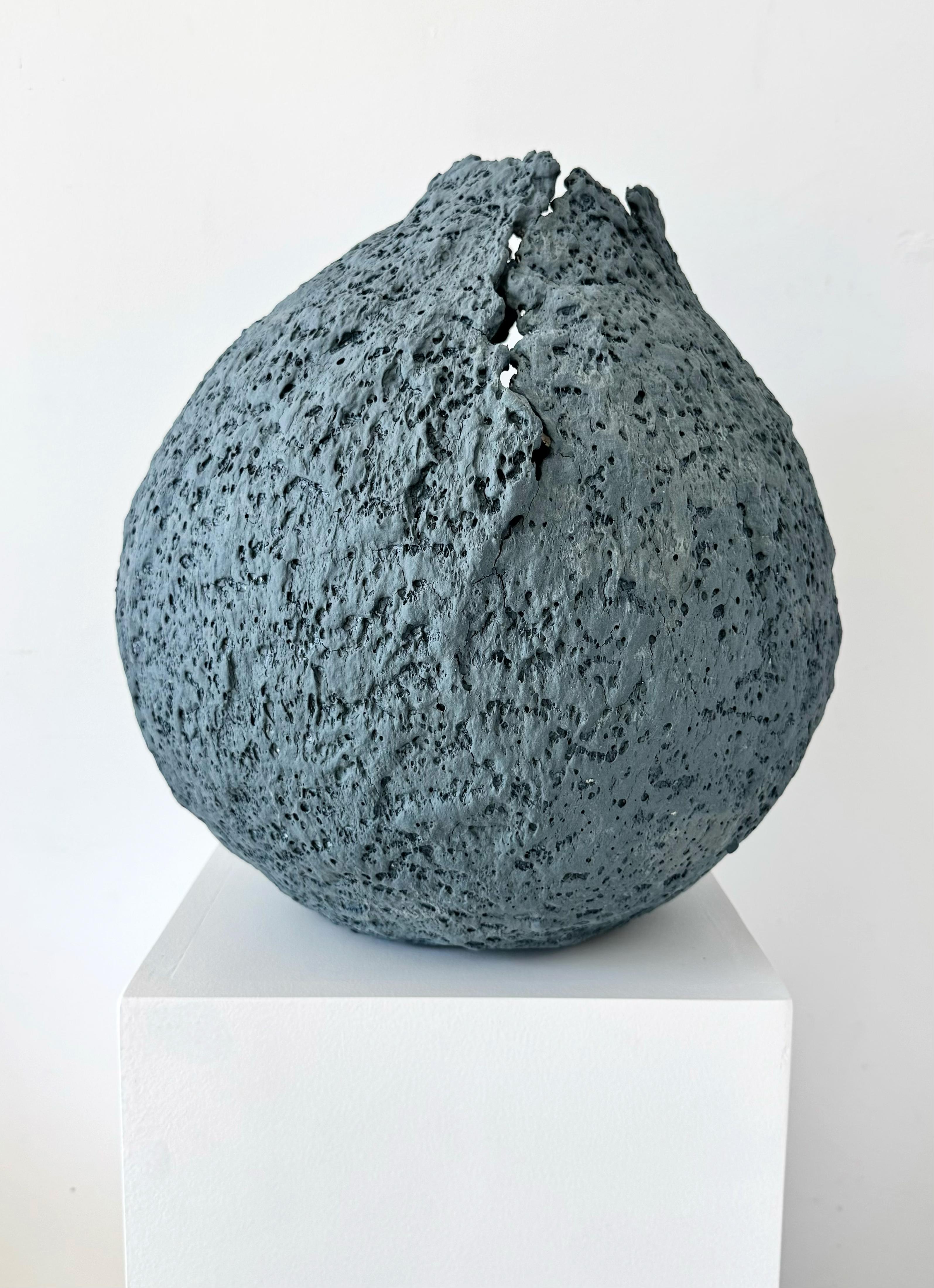 Anabelle is a gorgeous textured handbuilt porcelain sculpture. Unglazed she got her color by adding stains to the clay itself. A beautiful collectable statement piece. Can be glazed with a clear matte finish upon request for easier cleaning.