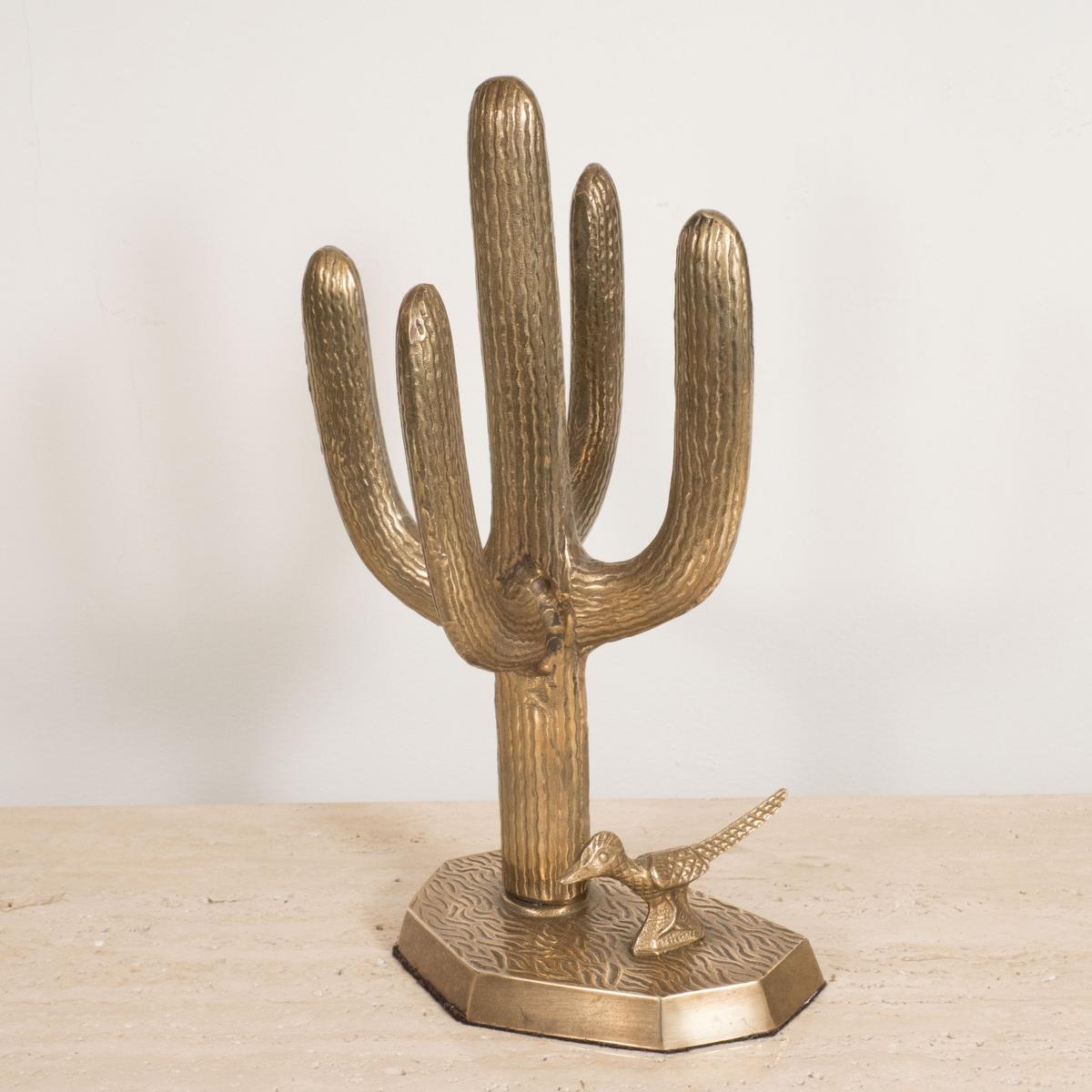 Textured brass cactus sculpture.