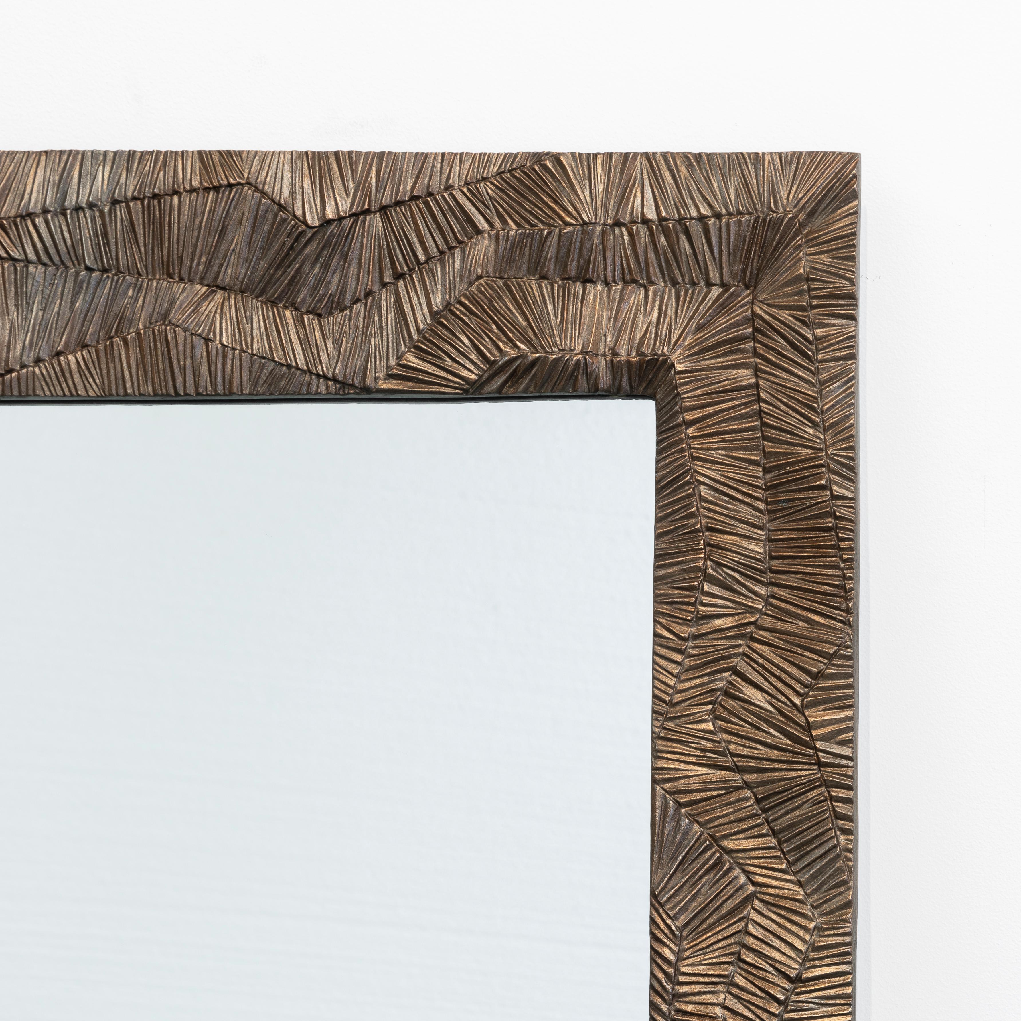 Large mirror in texture bronze 

Anasthasia Millot’s new collection of delicately and rigorously crafted furniture is a feat. In 2014 she brought us her first groundbreaking collection influenced by her studies in fashion design with subtly dynamic