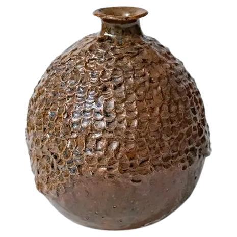 Florero de capullos con textura en venta