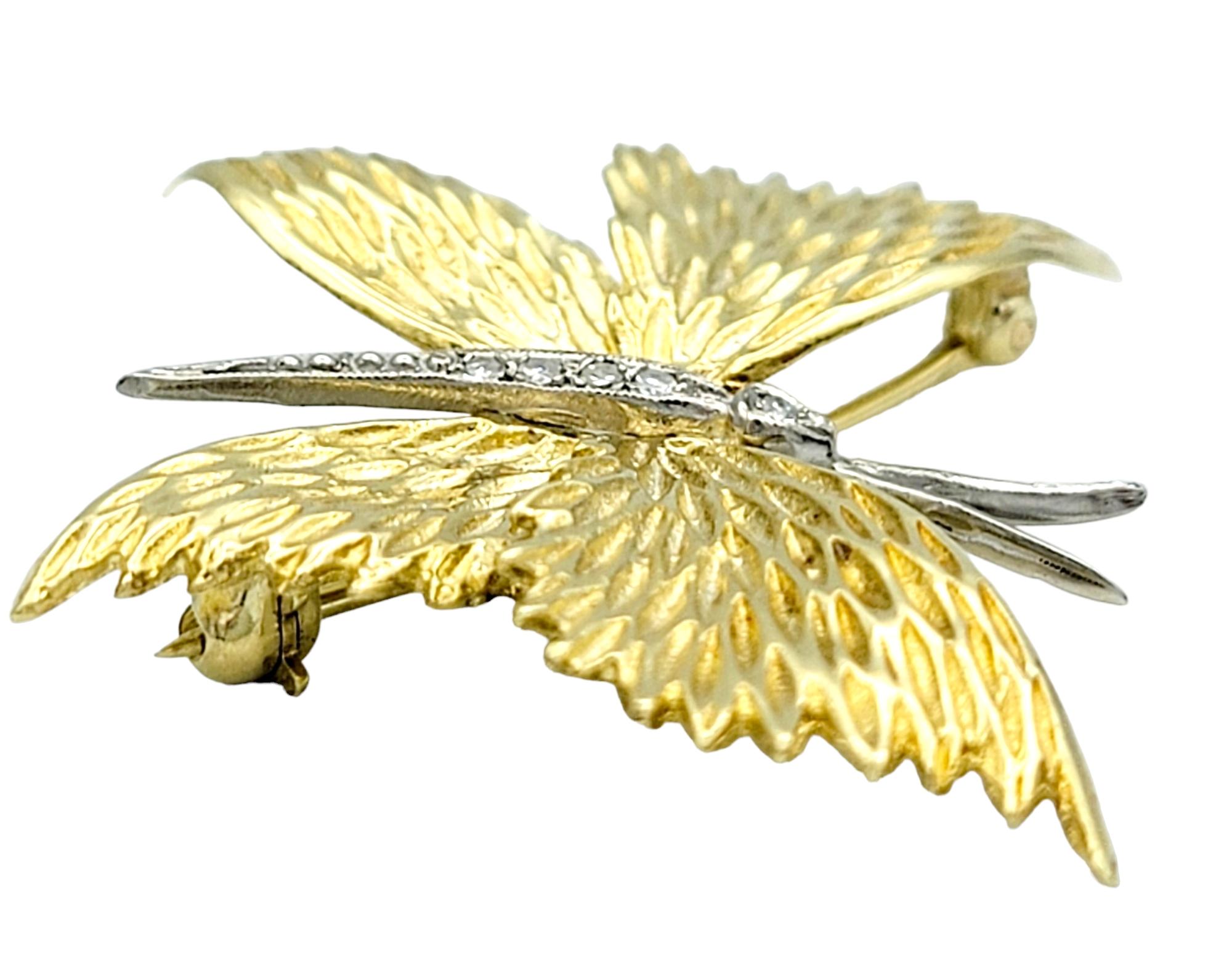 Contemporary Textured Butterfly Brooch / Pin with Round Diamonds Set in 18 Karat Yellow Gold For Sale