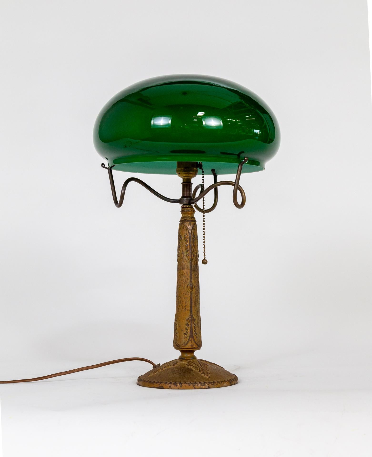 Early 20th Century Textured Cast Metal Nouveau Lamp w/ Green Glass Shade & Curled Shade Holder For Sale