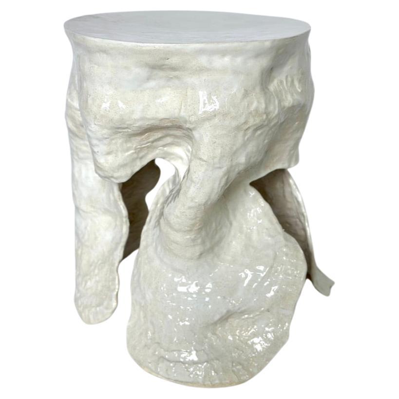 textured ceramic cocktail table in white  For Sale