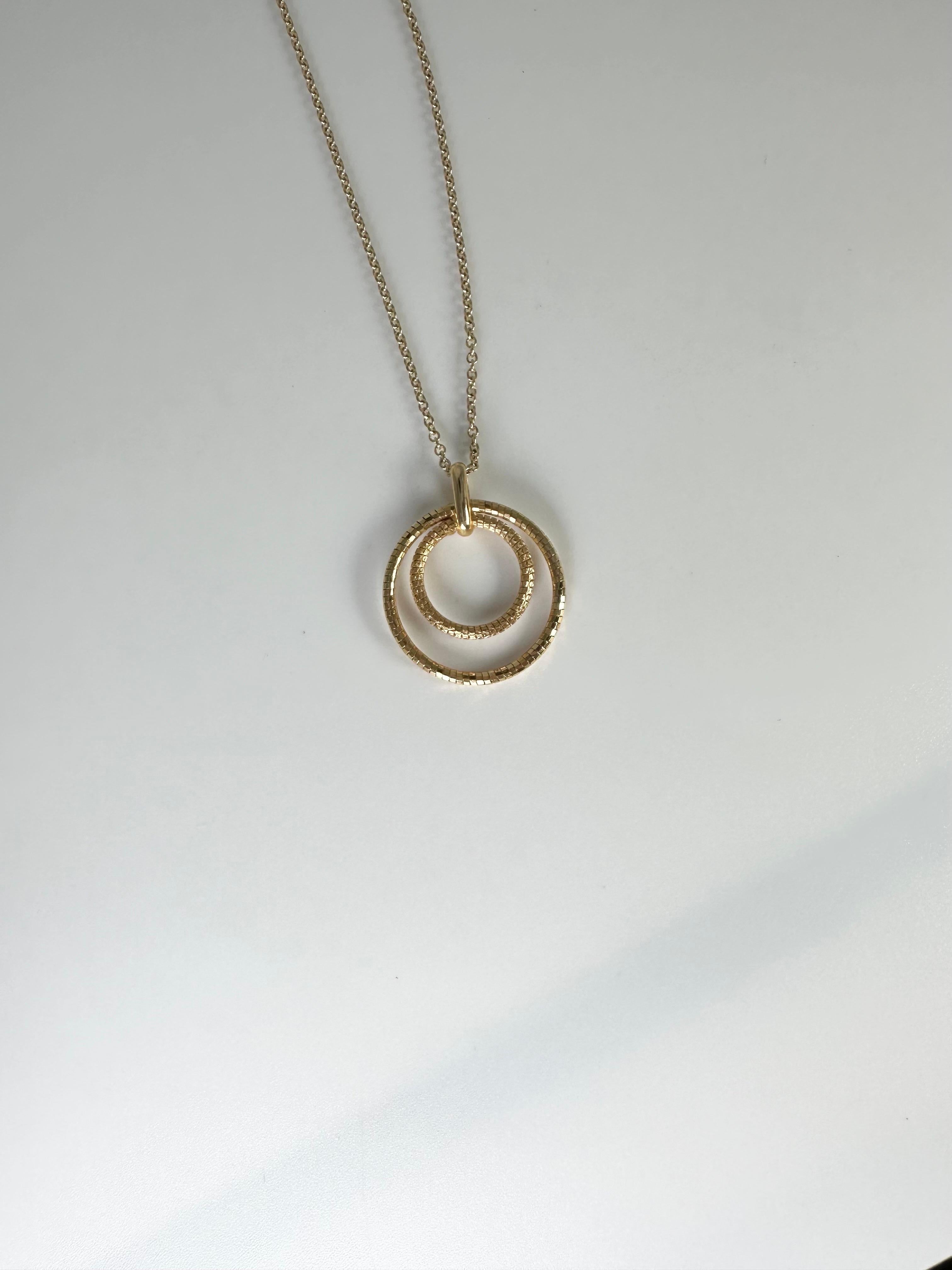 Modern textured circle pendant necklace in 14KT yellow gold, minimalistic pendant on 18 inches chain.
GOLD: 14KT gold
Grams:2.10
Item#: 435-00032OF

WHAT YOU GET AT STAMPAR JEWELERS:
Stampar Jewelers, located in the heart of Jupiter, Florida, is a